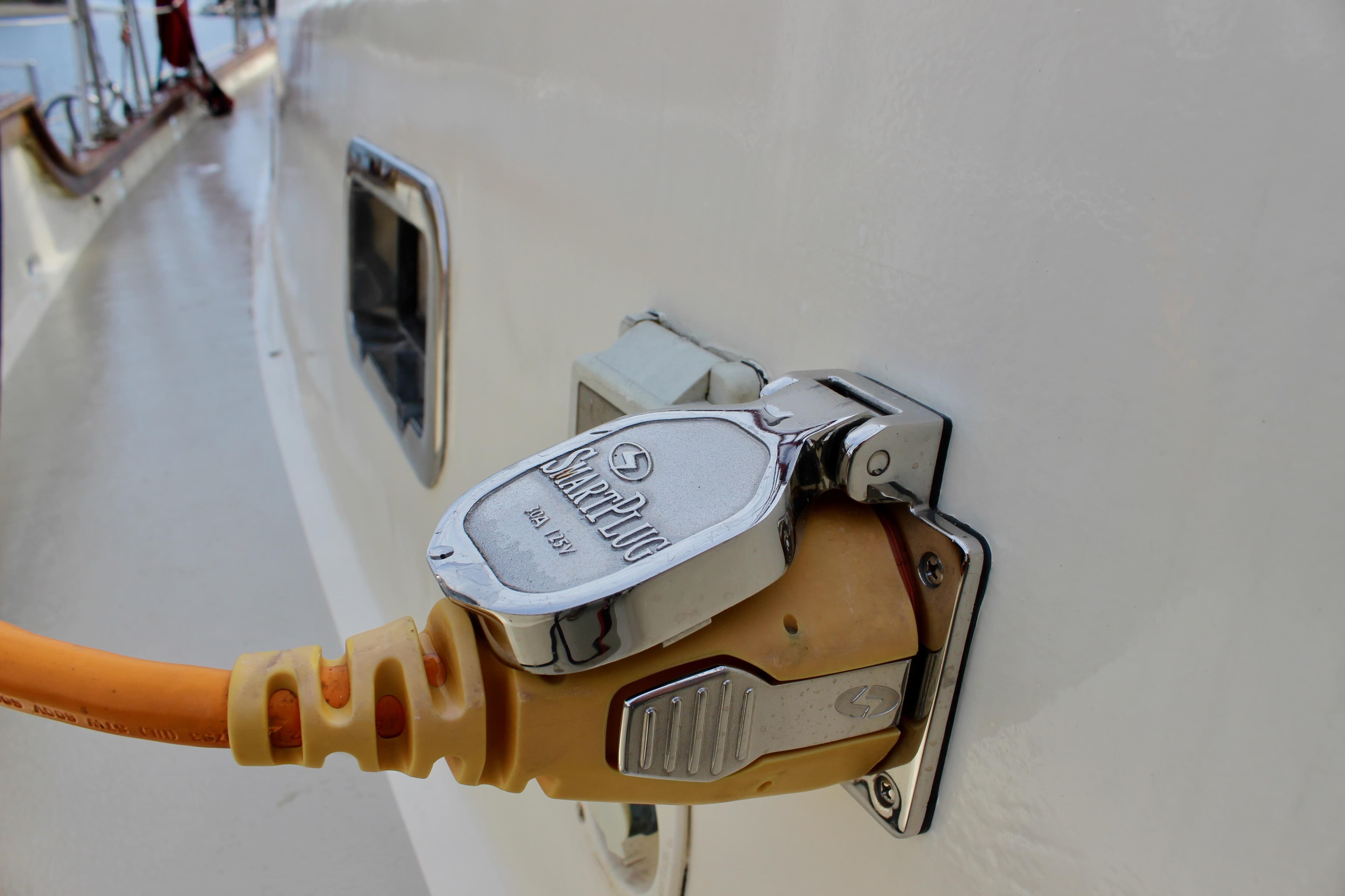 Power connection on 1981 Skookum 53 boat with yellow cable.