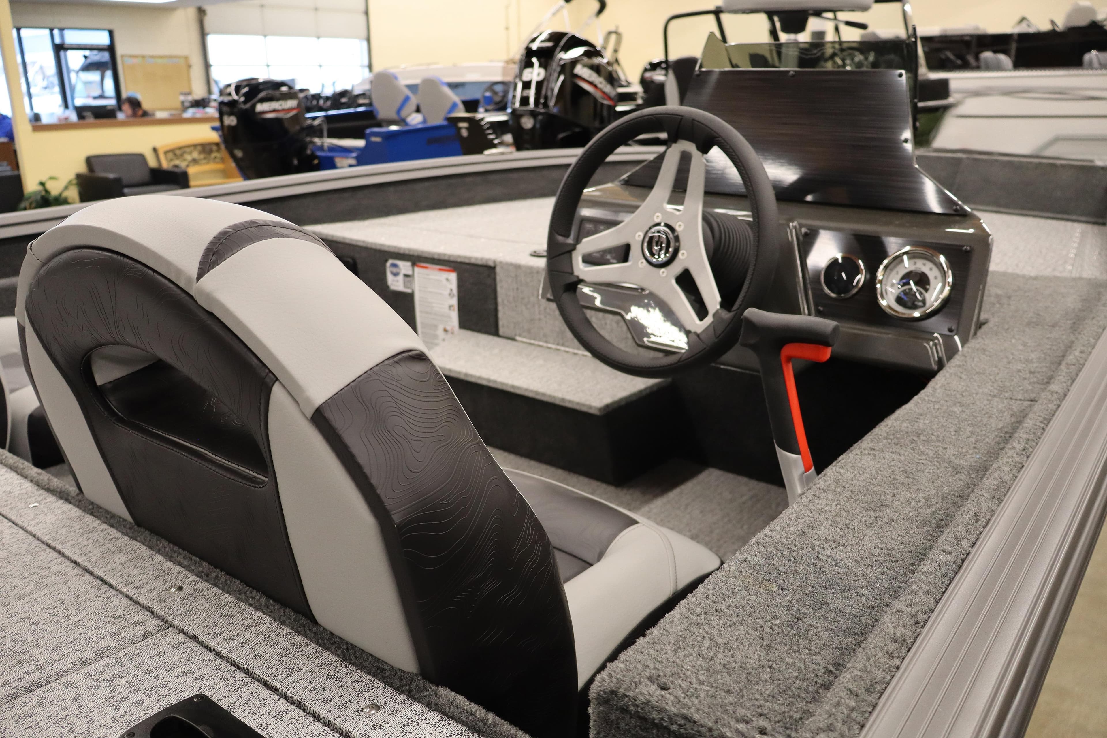 2026 Smoker Craft Viper 175 Pro boat interior with steering wheel and dashboard.