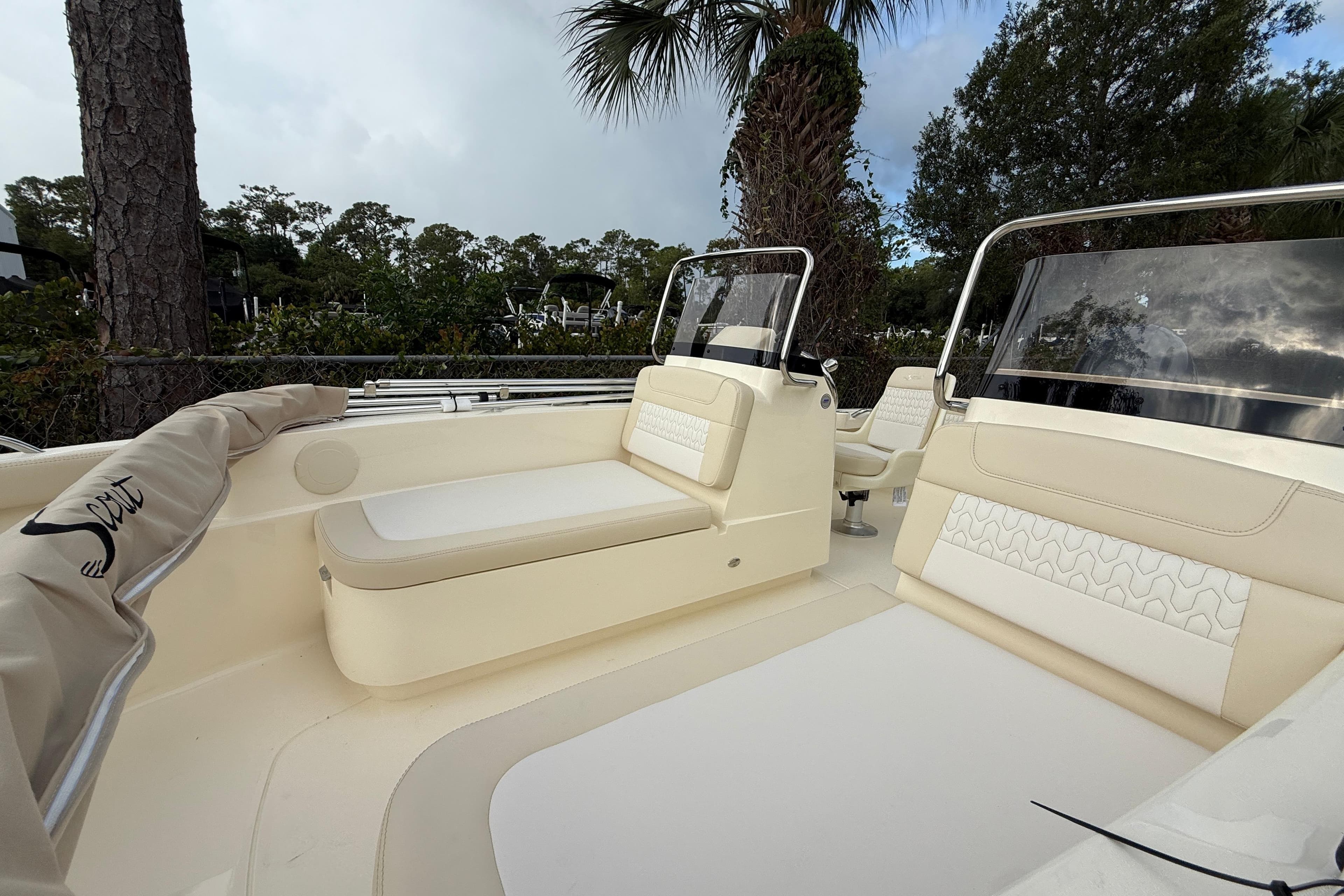 2026 Scout 188 Sport Dorado boat interior with beige seating and sleek design.