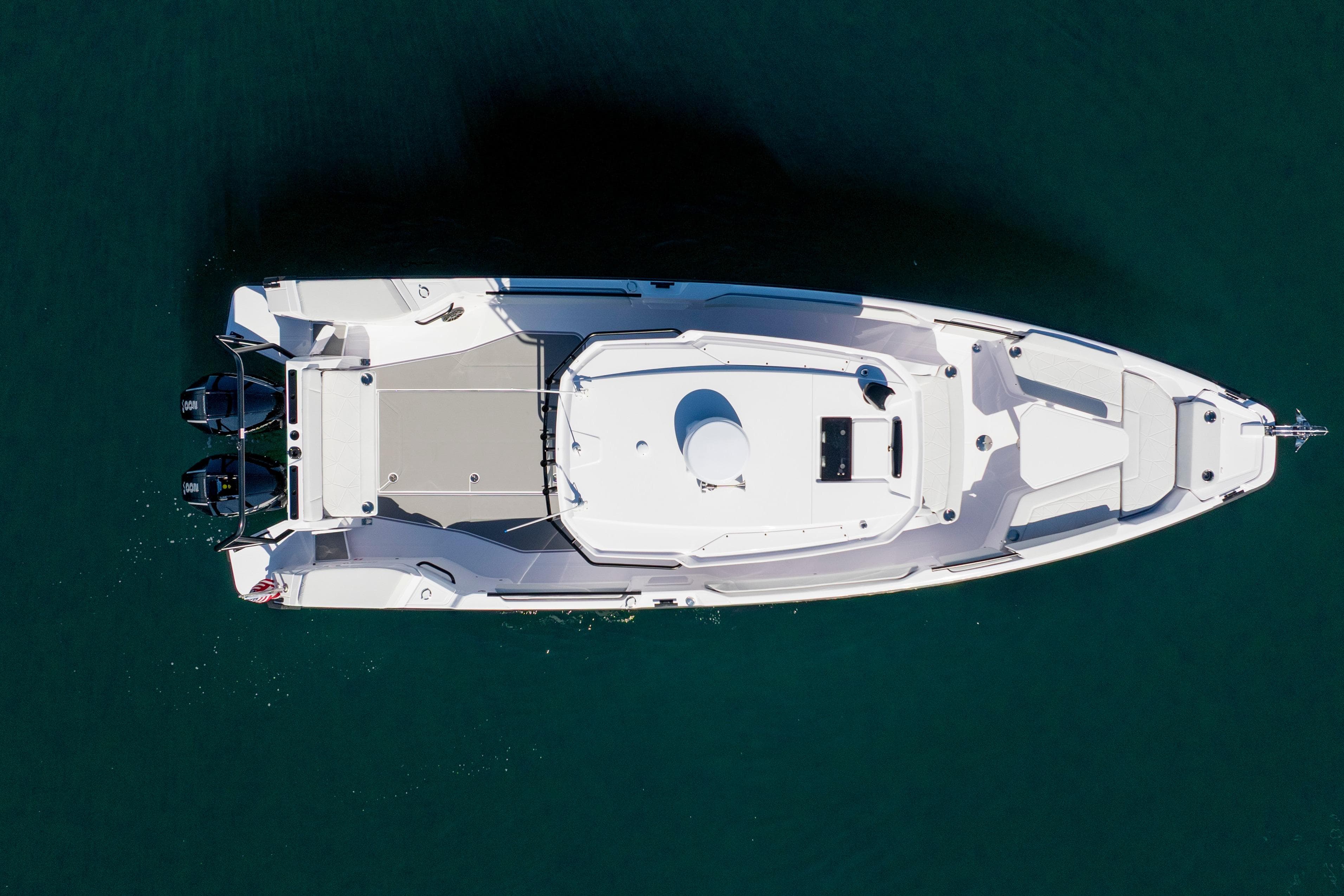 Overhead view of 2026 Axopar AX29 CCX boat on clear water.