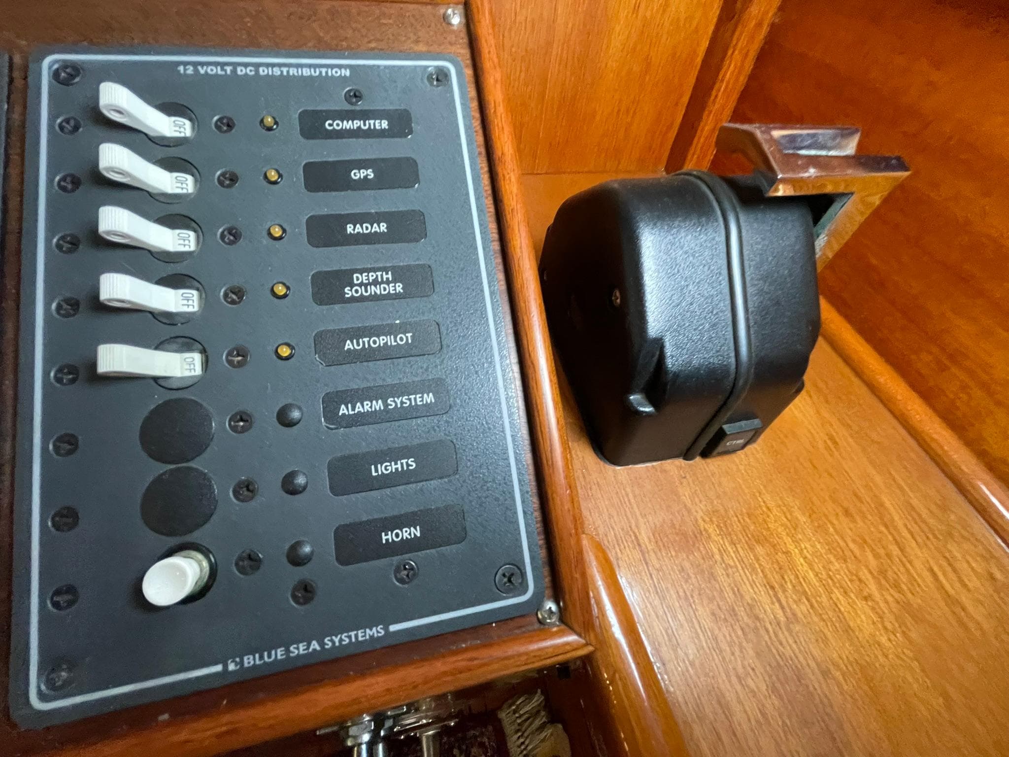 1959 Monk Express Cruiser control panel with switches for GPS, radar, and more.