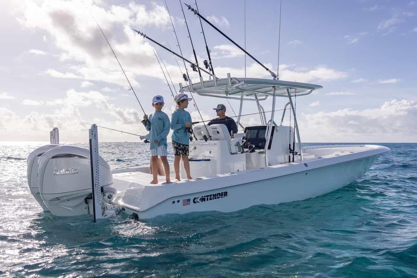 Manufacturer Provided Image: 2025 Contender 29 Bay boat with anglers fishing in open ocean.