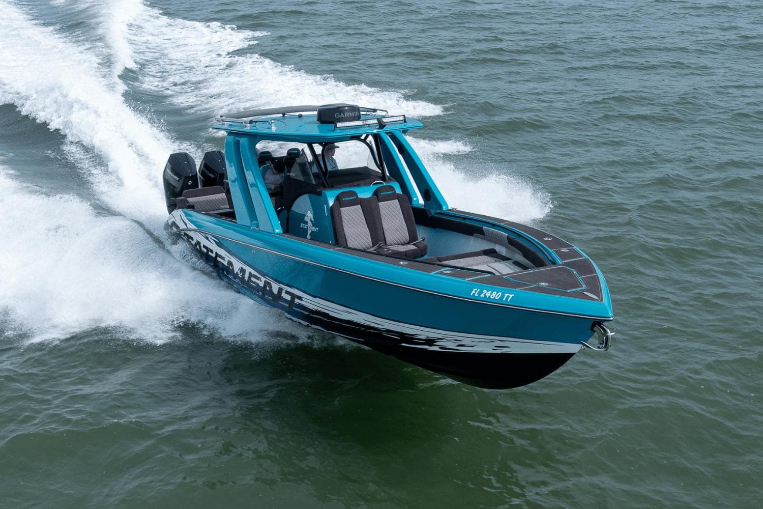 2024 Statement 38 Open boat cruising on water, showcasing sleek design and powerful performance.