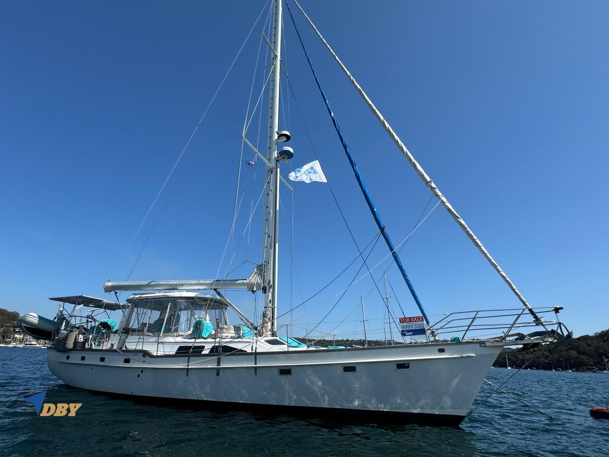 Sailing yacht Irwin 54, 1990 model, anchored on a sunny day.