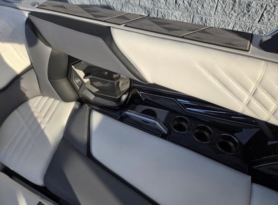 Interior of 2025 Tigé Ultré 23ZX boat with sleek white and black seating.