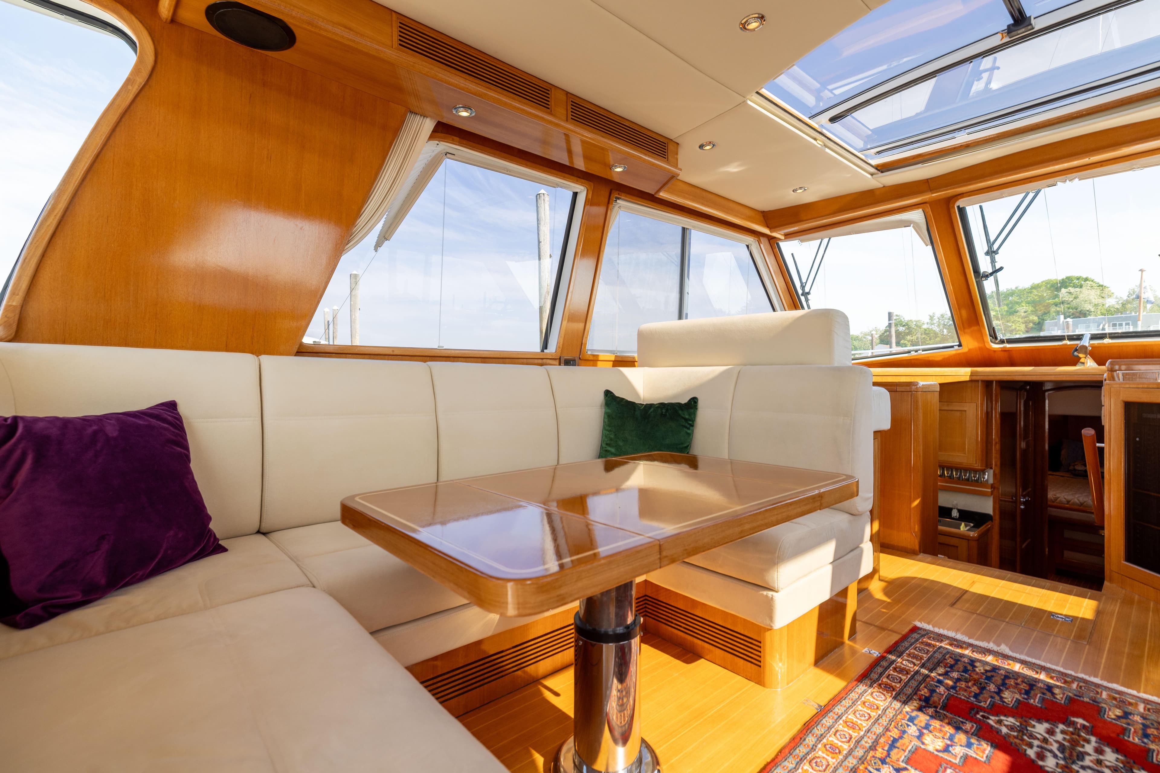 Luxurious 2008 Grand Banks 45 Eastbay SX yacht interior with plush seating and elegant wood finishes.