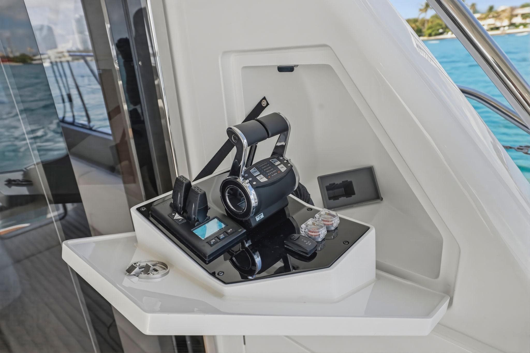 Control panel of 2026 Princess F65 yacht with throttle and navigation controls.