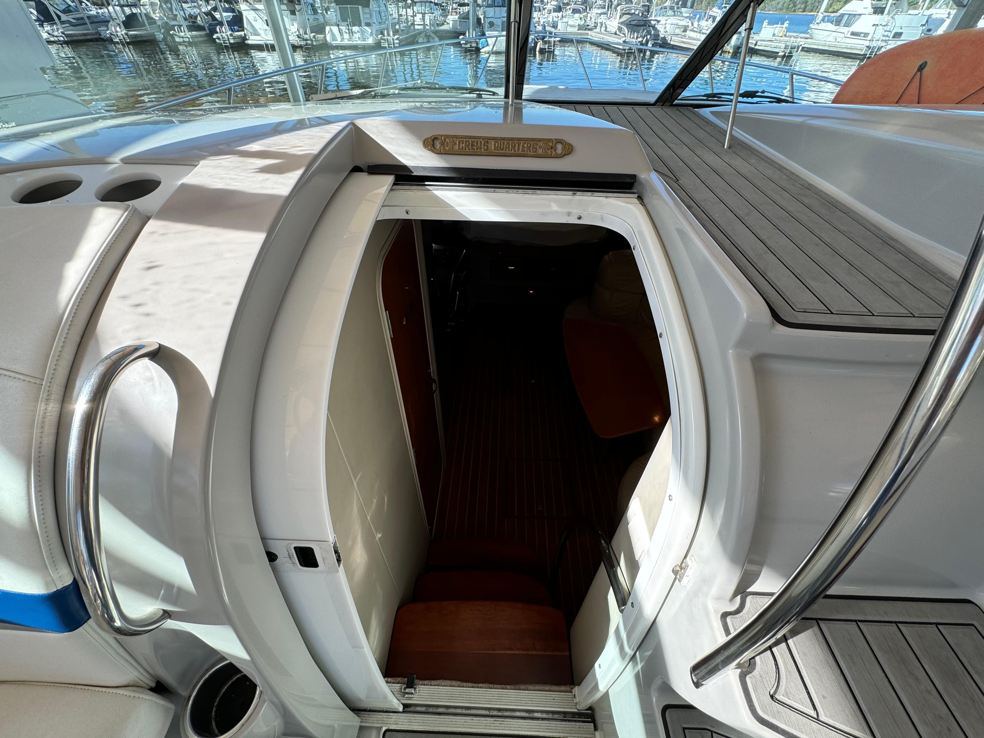 Entrance to cabin of 2004 Formula 37 Performance Cruiser, docked at marina.