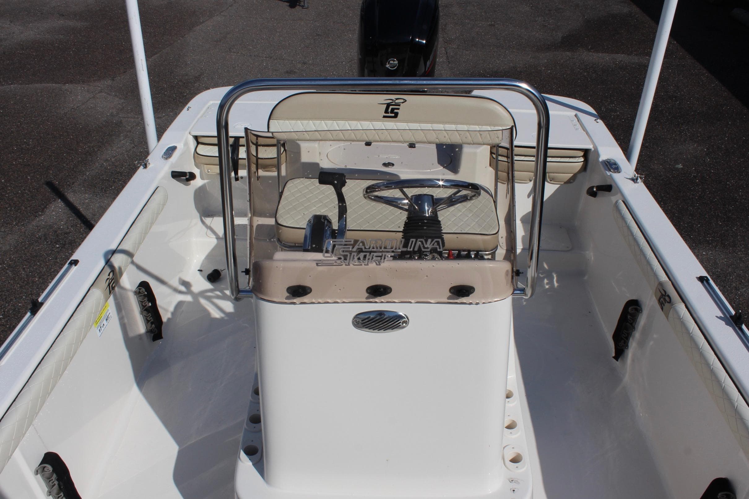 2022 Carolina Skiff 17 LS boat interior with steering console and seating.