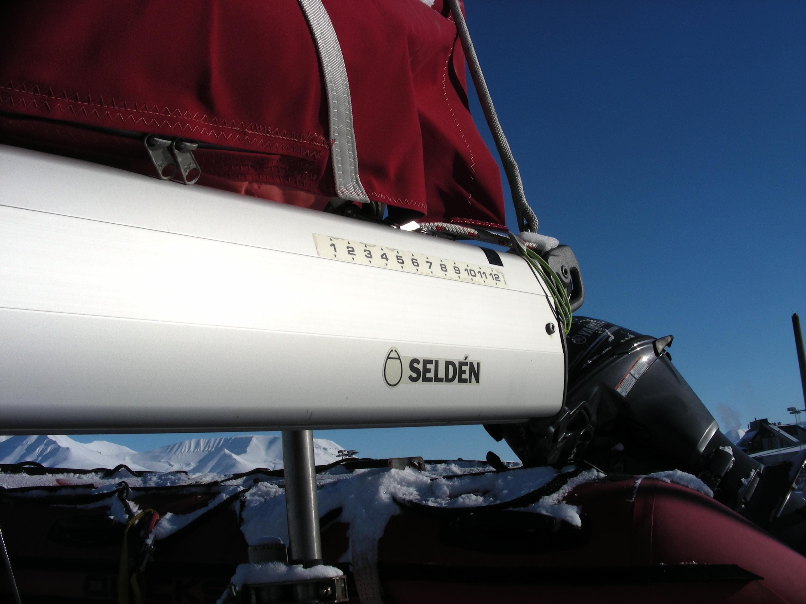 Seldén boom on 2015 Motorsailer research vessel with snowy backdrop.