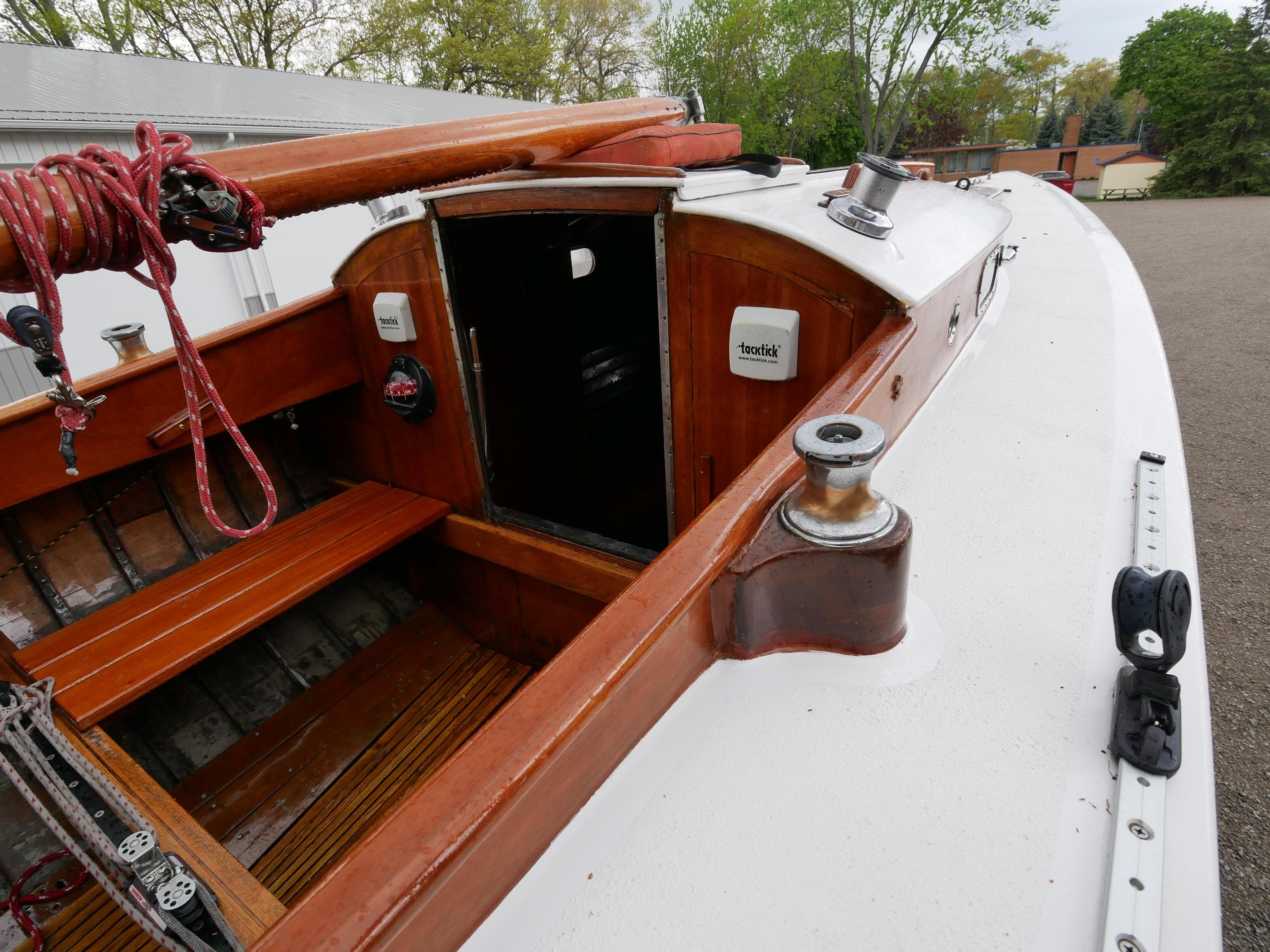 1935 Custom 44' 30-Square Meter Sailing Yacht cockpit with wooden details and open hatch.