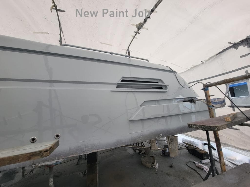 2018 Canard Yachts eMotion HYBRID undergoing a new paint job in a workshop.