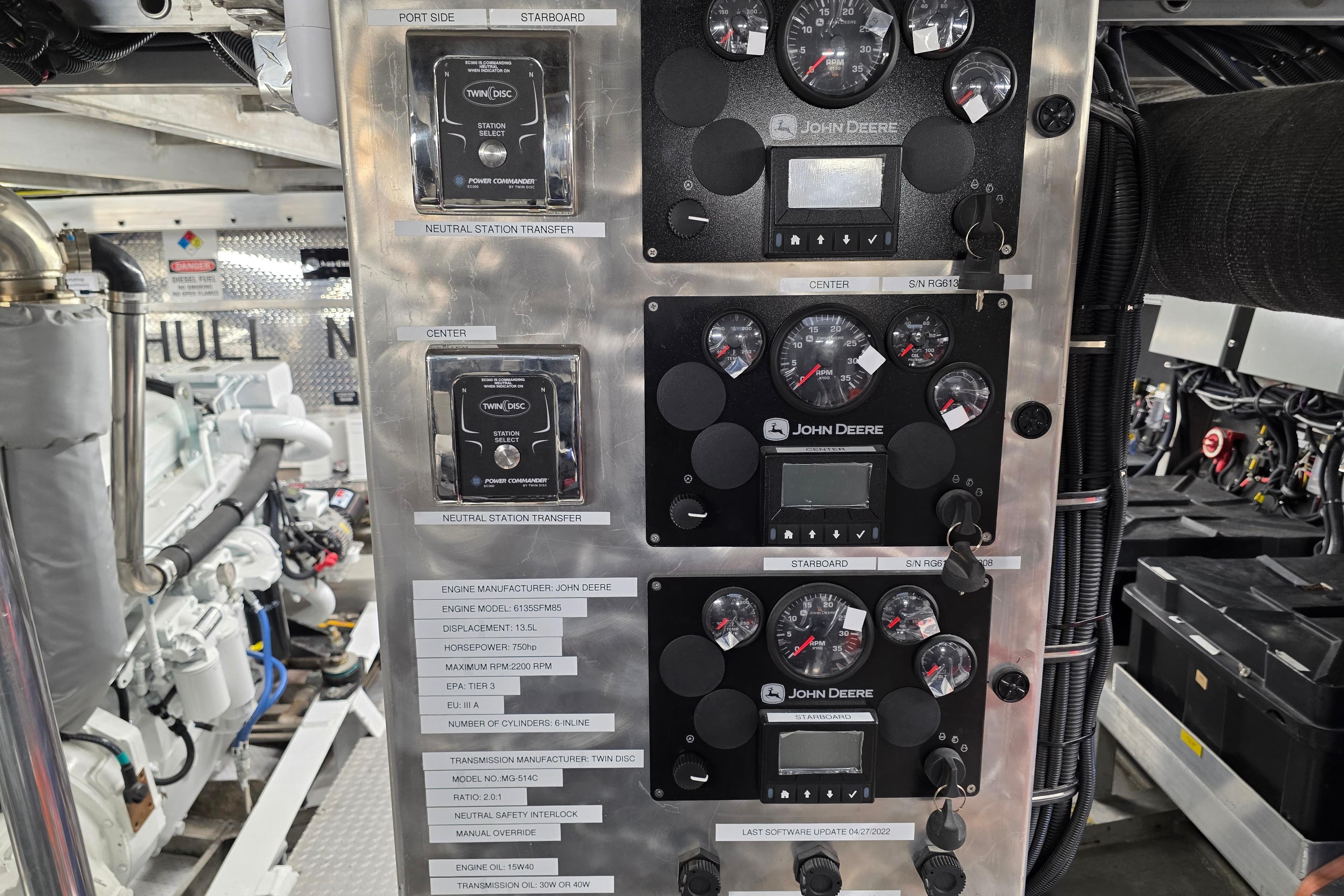 Engine room of 1986 Gulf Craft Passenger boat with John Deere control panels.