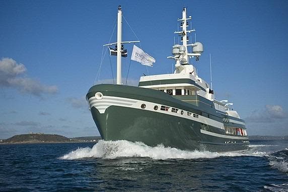 Luxury Pendennis Explorer yacht cruising on open water, 2009 model.