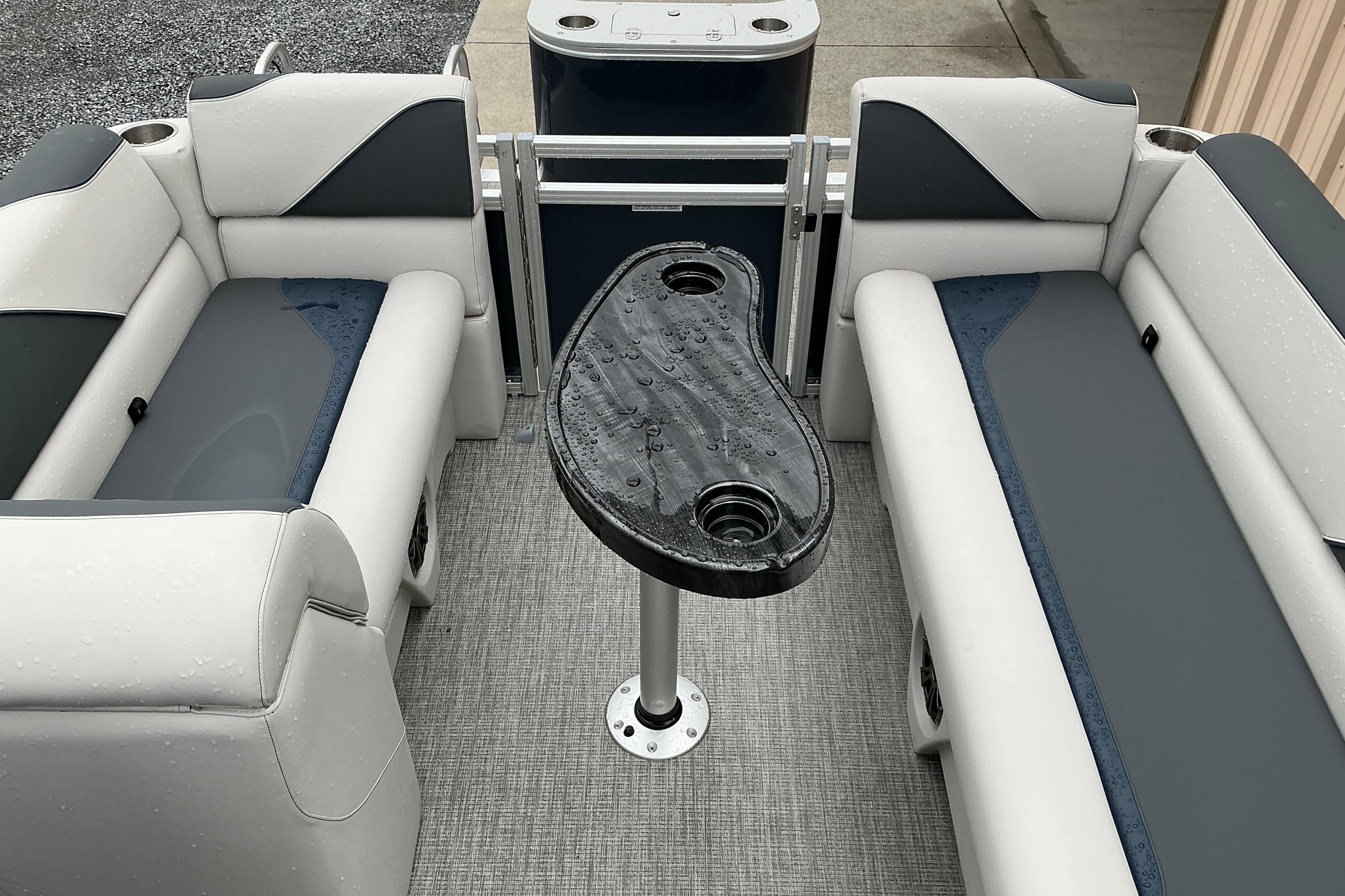 2026 Avalon Venture Quad Lounge interior with sleek seating and modern table design.