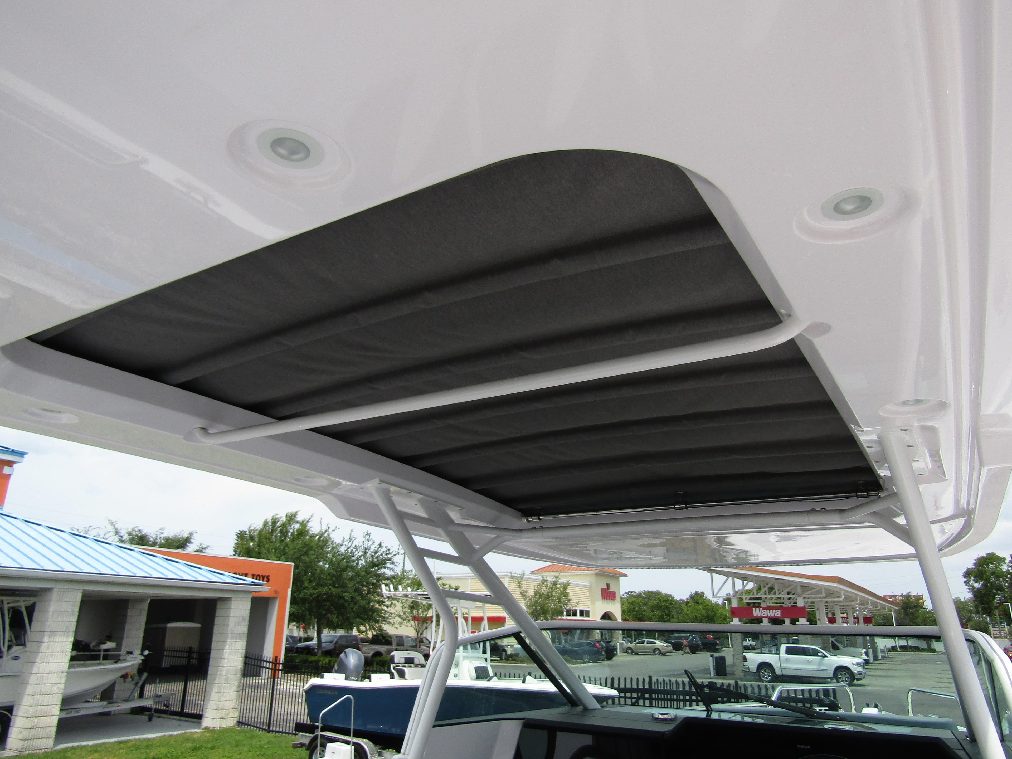 2024 Axopar 37 Sun Top boat roof detail with retractable sunshade.