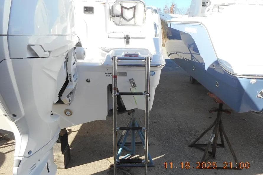 Sea Fox 268 Traveler boat with ladder, docked outdoors, dated November 18, 2025.