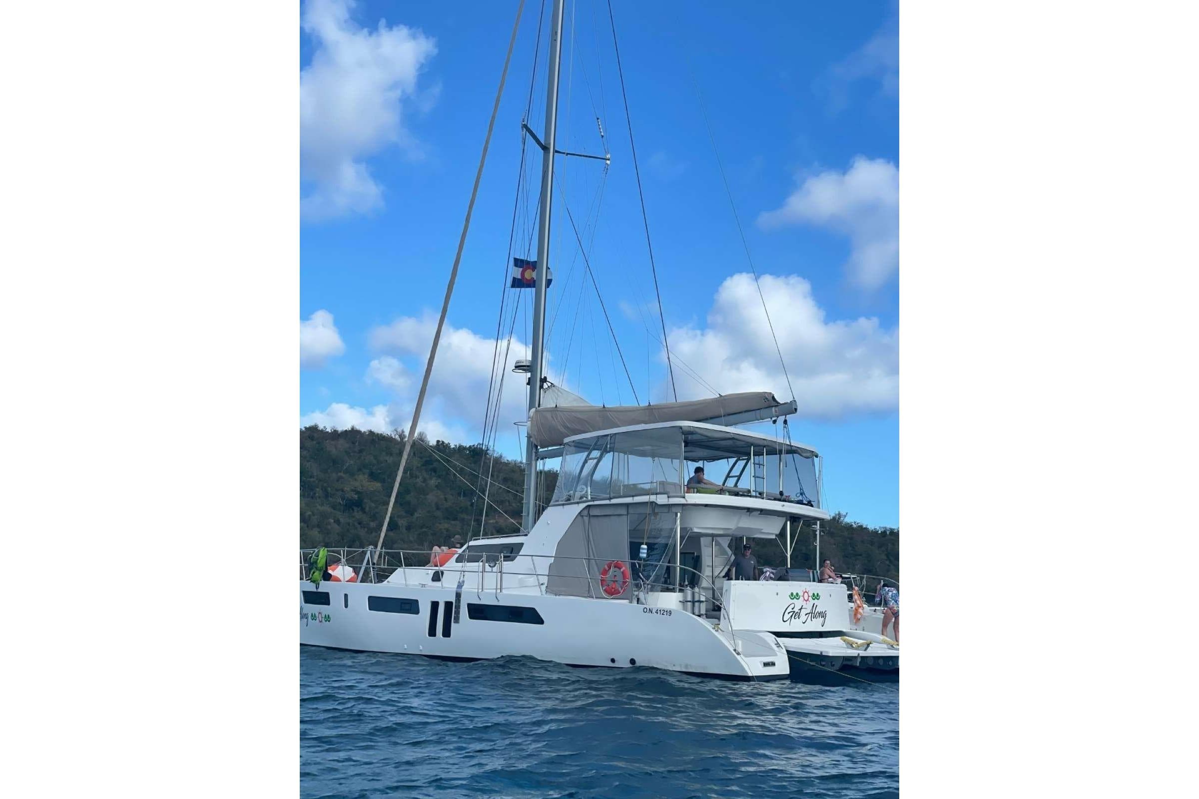 2020 Royal Cape Catamarans Majestic 570 sailing on blue waters under a clear sky.