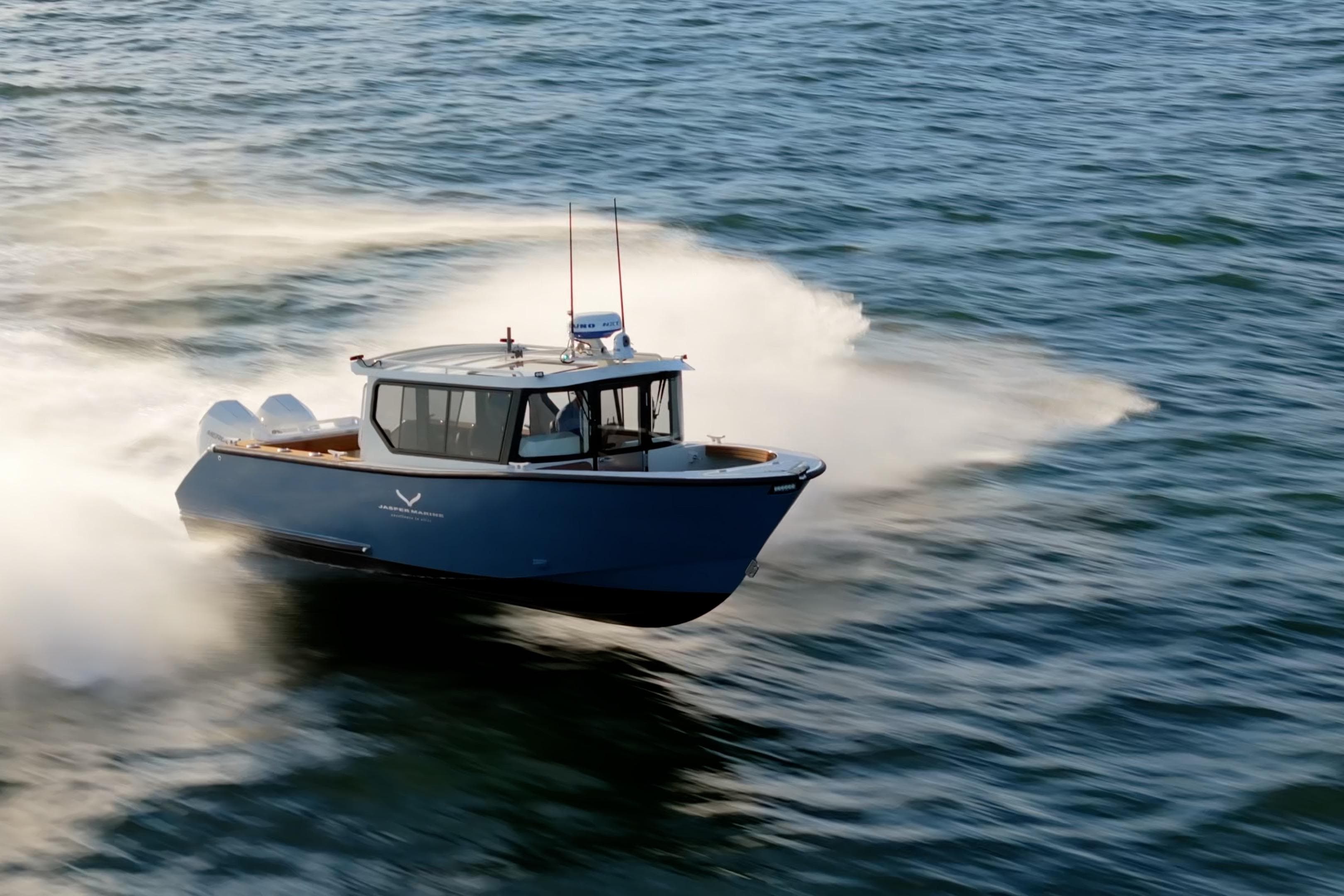 2026 Jasper Marine Defender 22 speeding on open water.