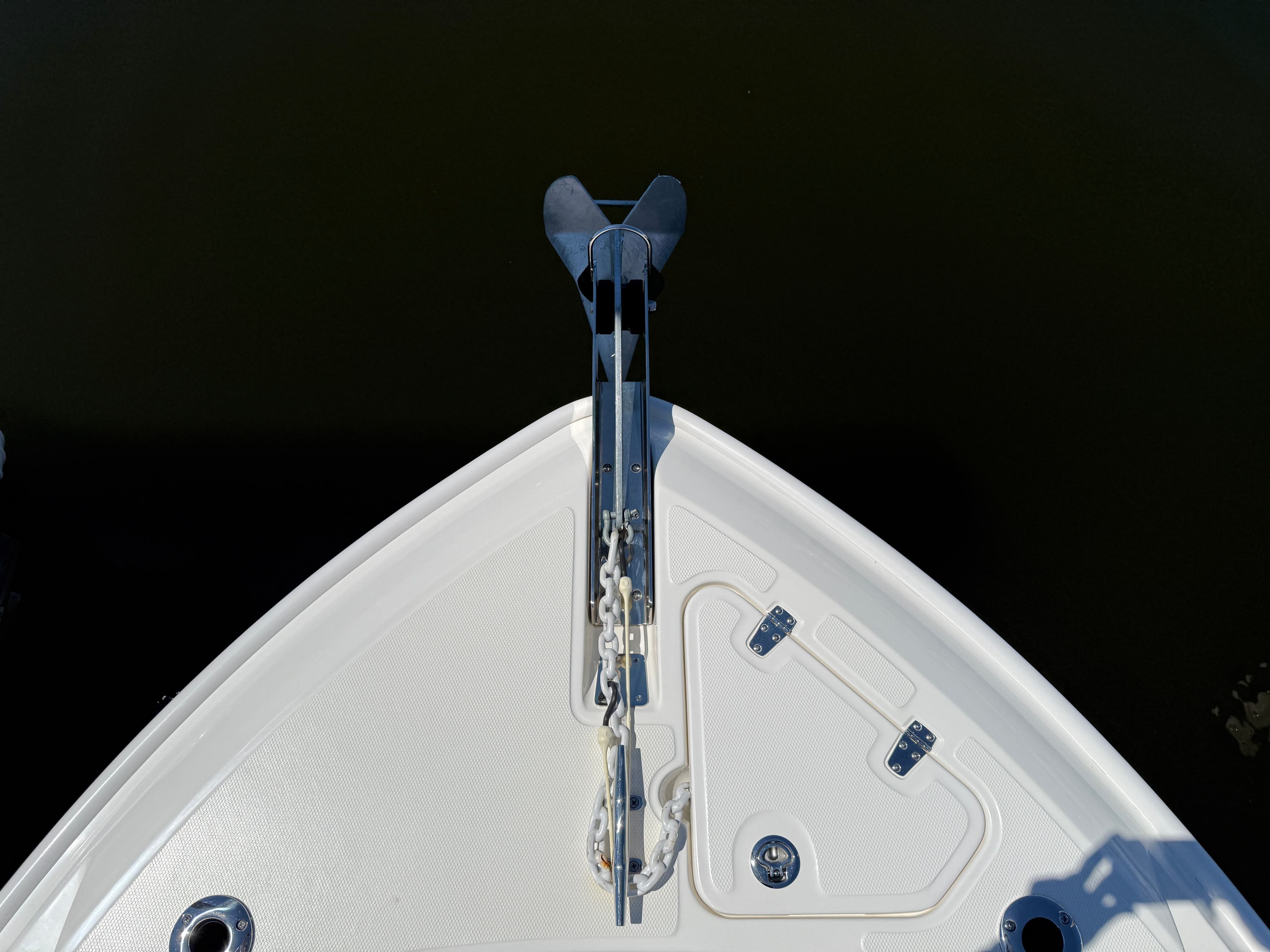 Bow of 2024 Boston Whaler 230 Outrage with anchor.