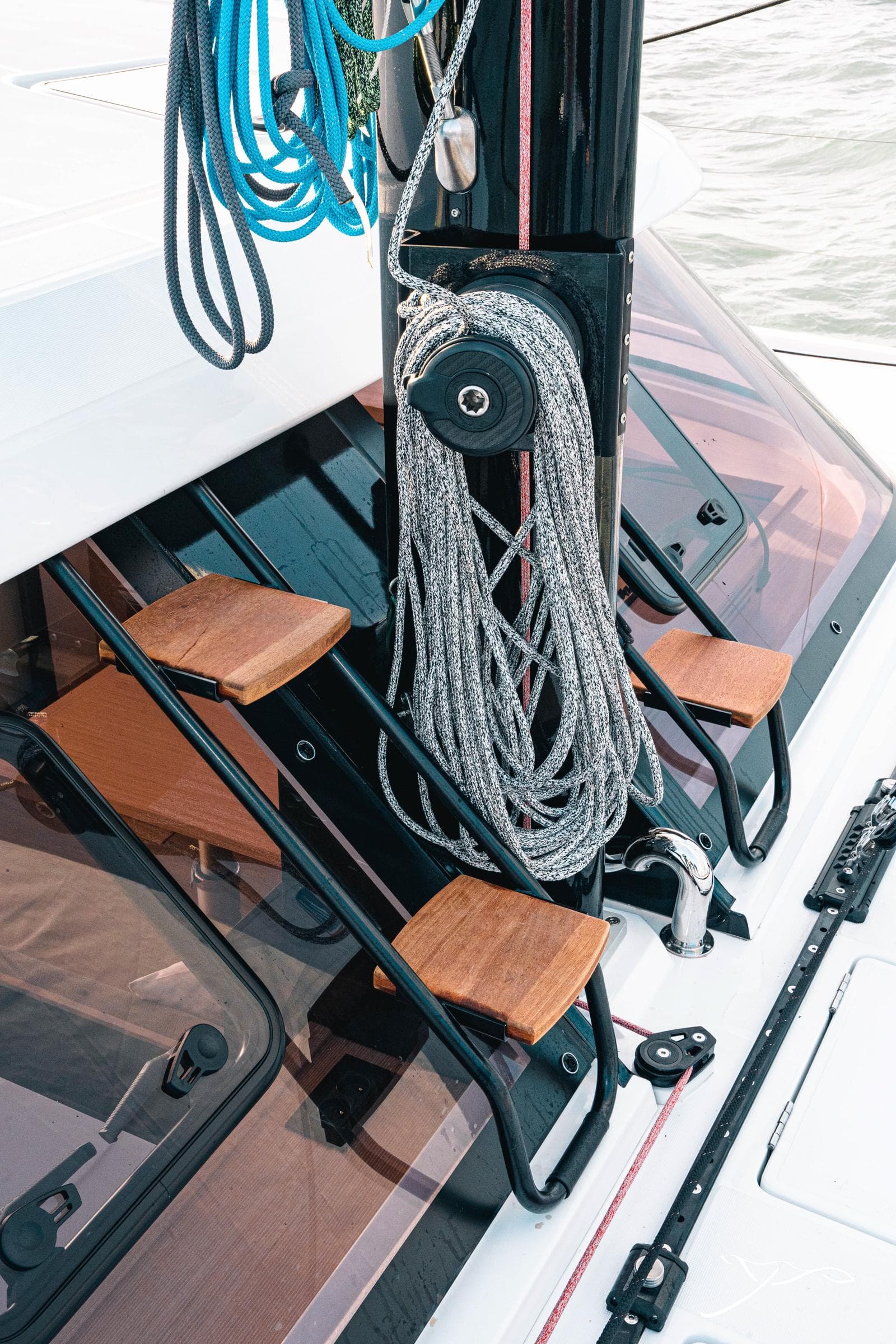 2025 Nautitech 40 Open yacht with ropes and wooden steps on deck.