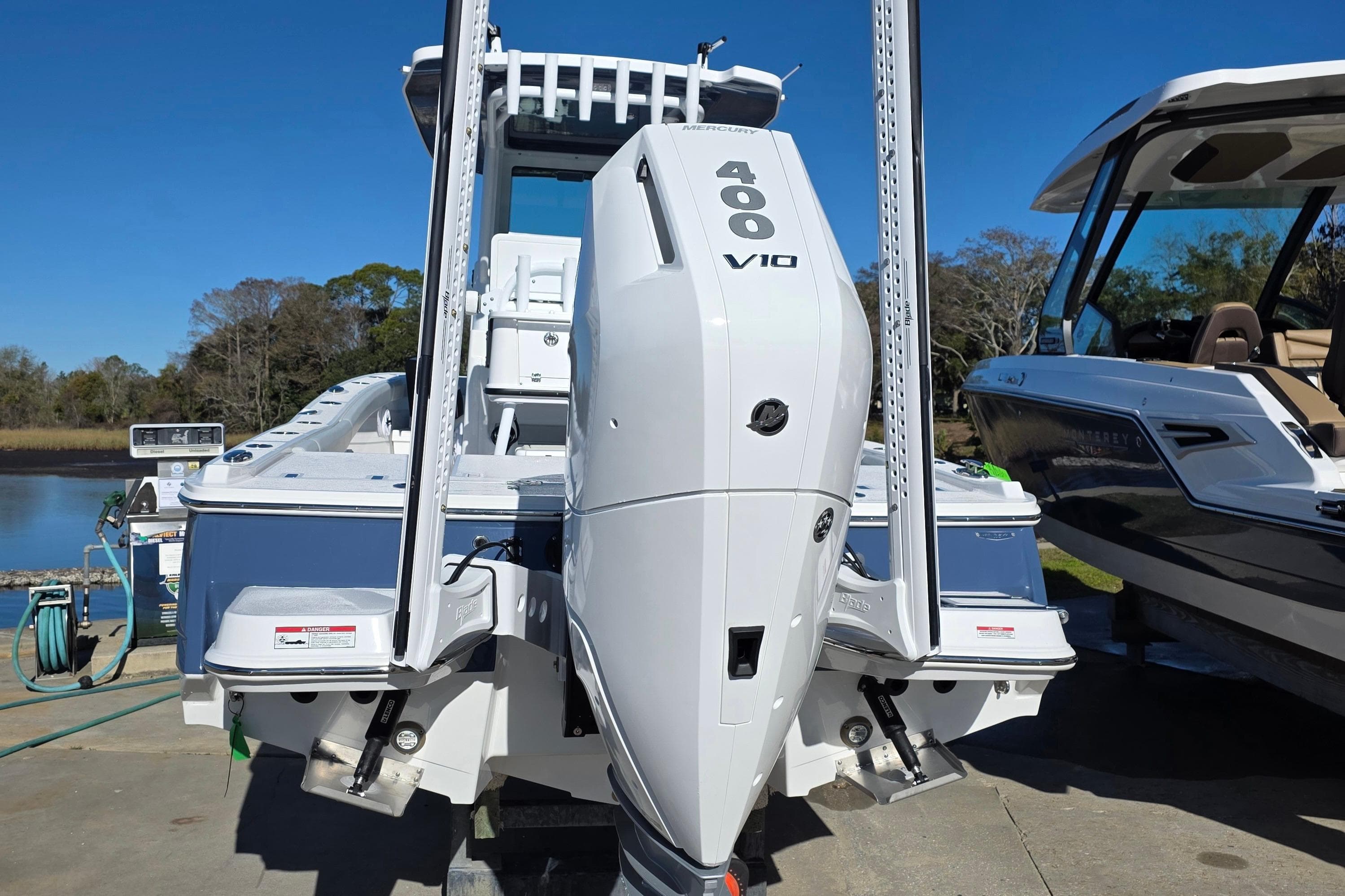 2026 Blackfin 262 HB boat with Mercury 400 V10 engine at dockside.