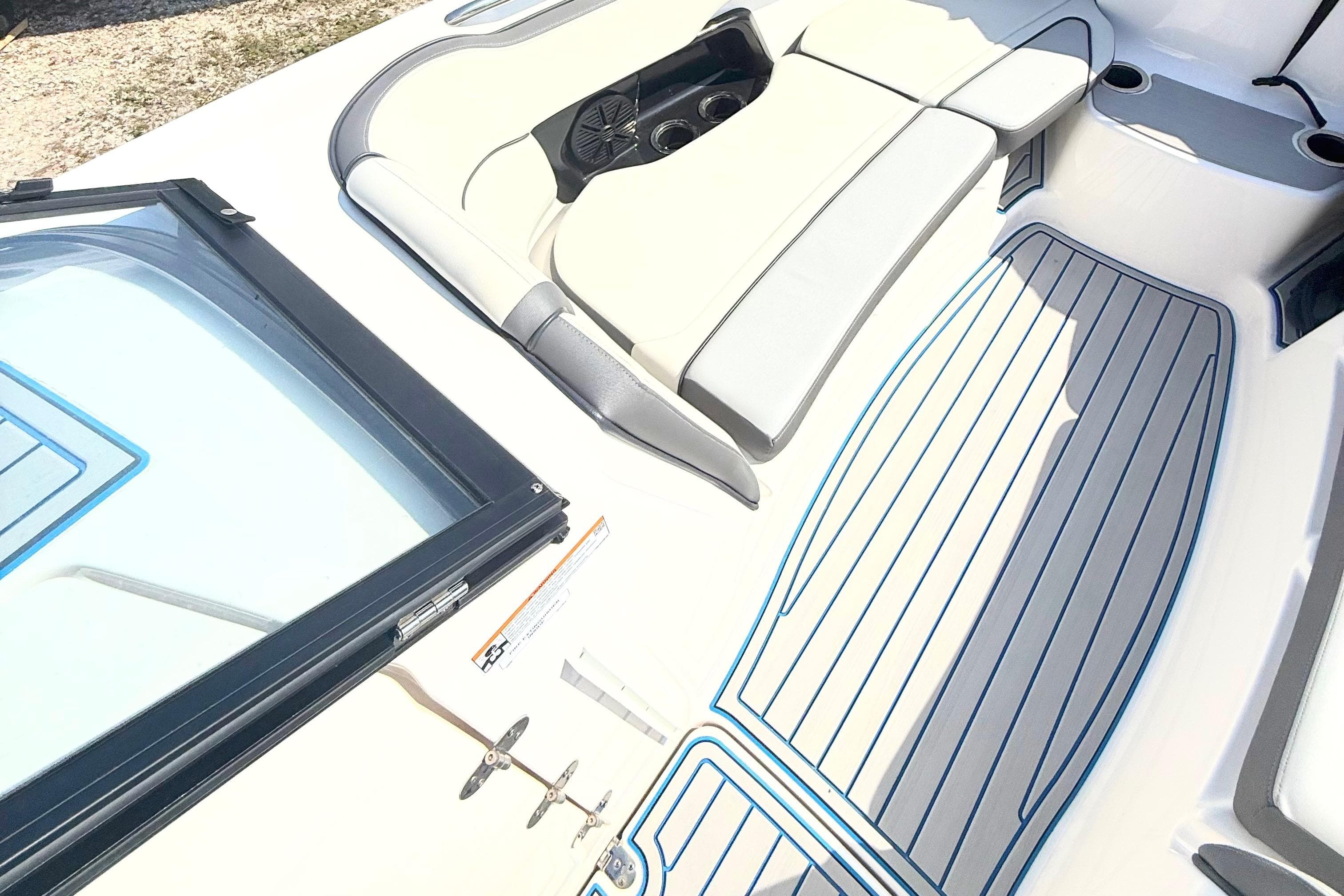 2023 Yamaha Boats AR250 interior with sleek seating and modern design.