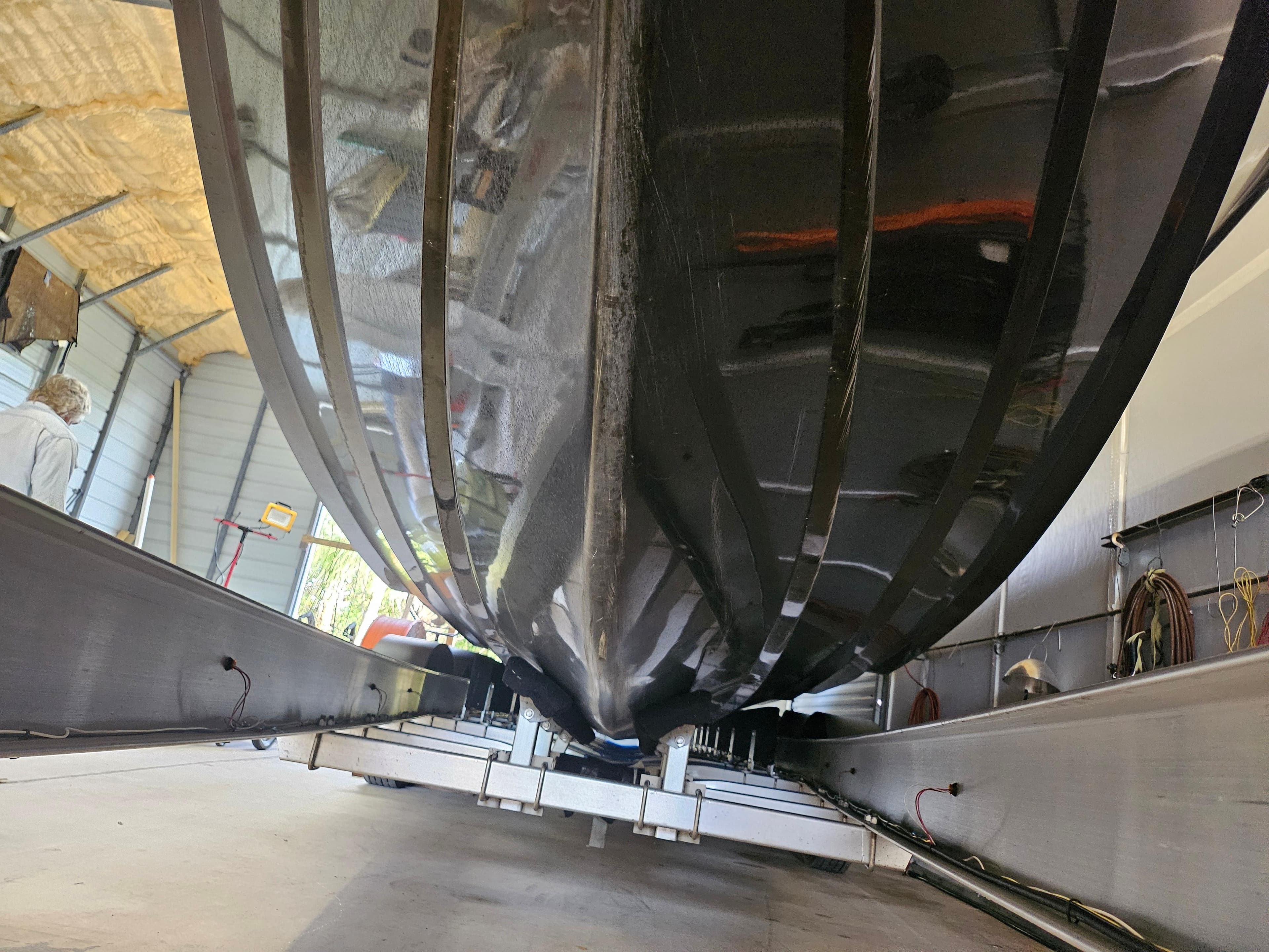 2021 Statement 350 Open boat hull in a workshop setting.