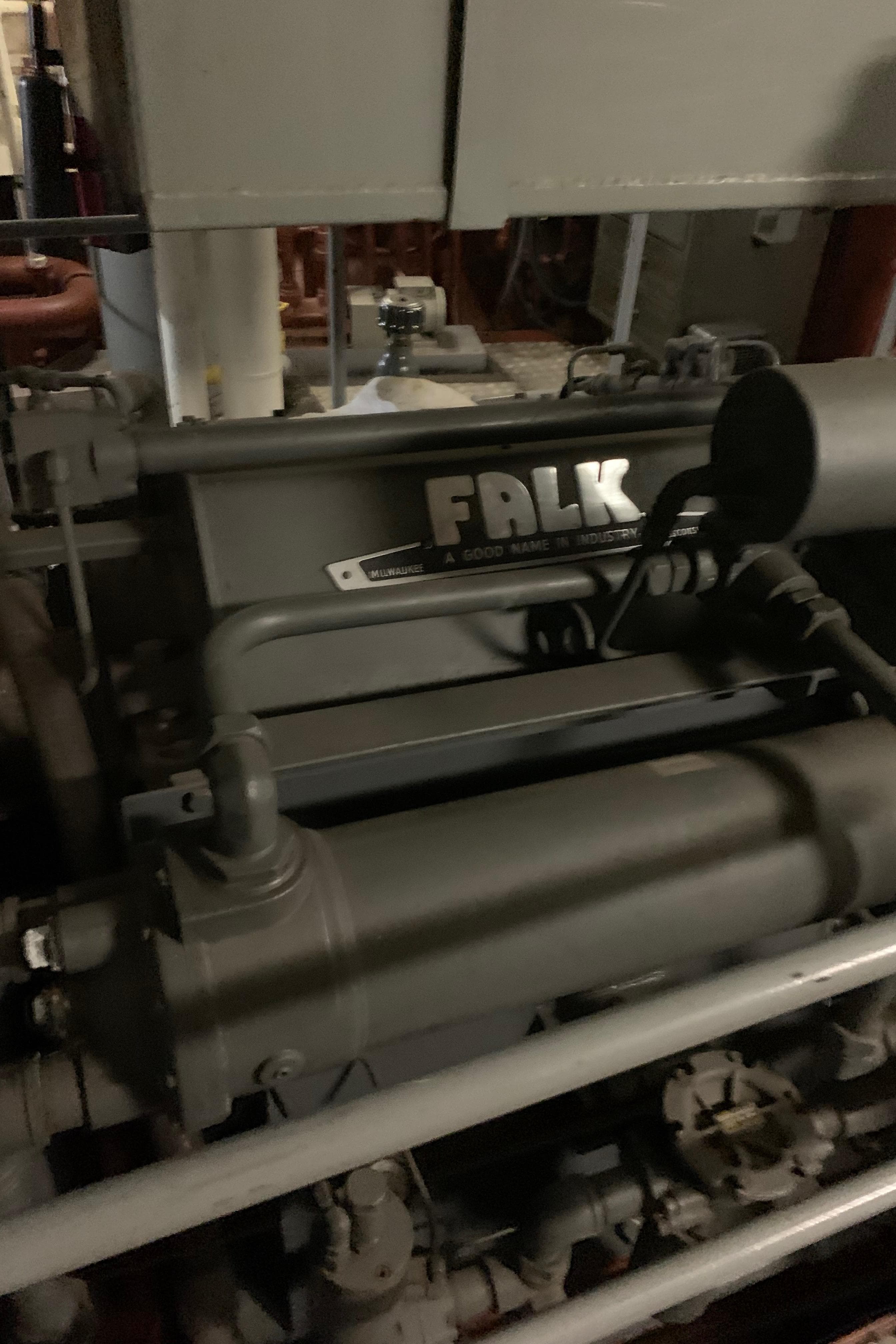 Engine room of 1955 Tugboat L-T 100 Steel Army Tug, featuring Falk machinery.
