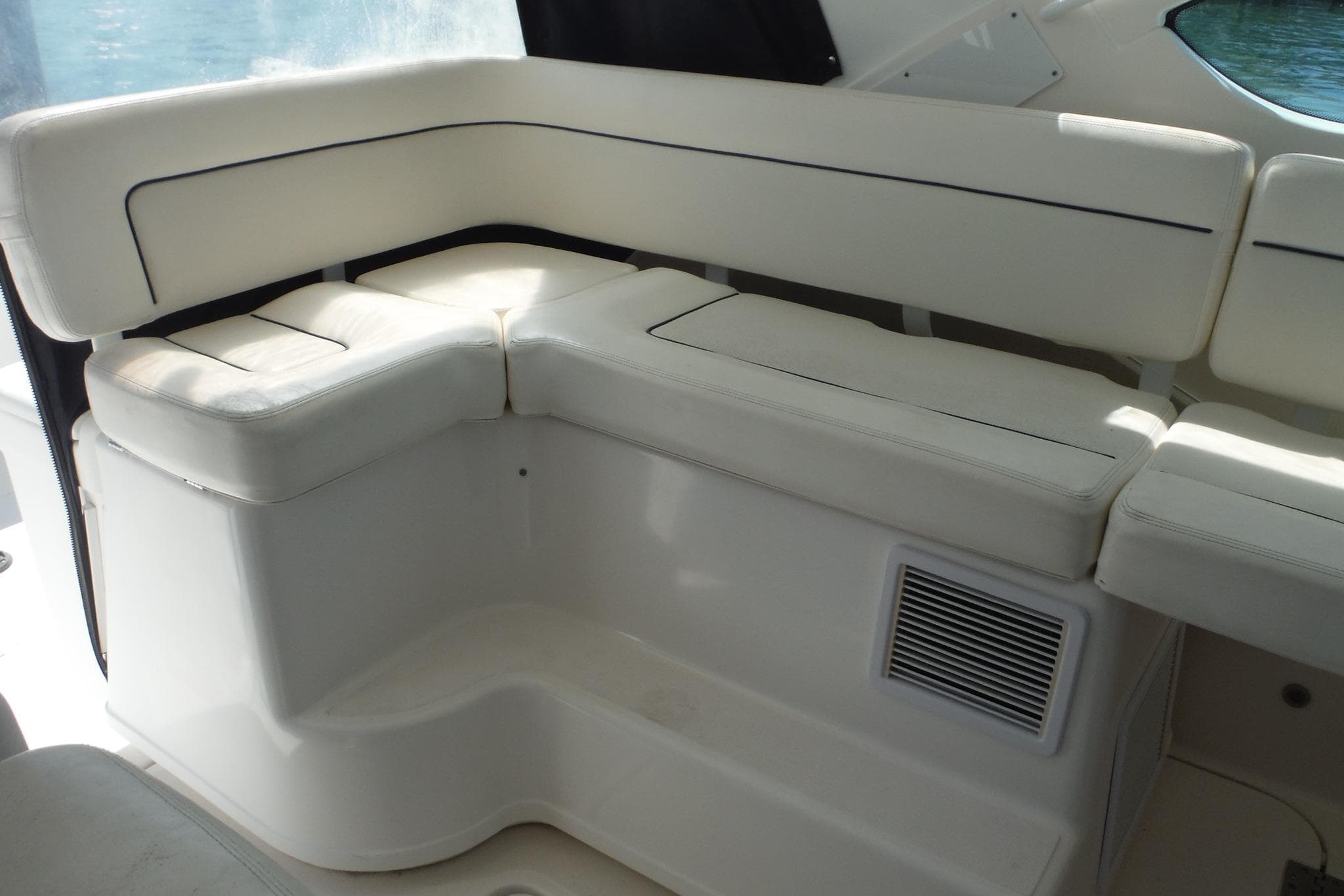 2007 Tiara Yachts 3600 Open interior seating with white cushions and sleek design.