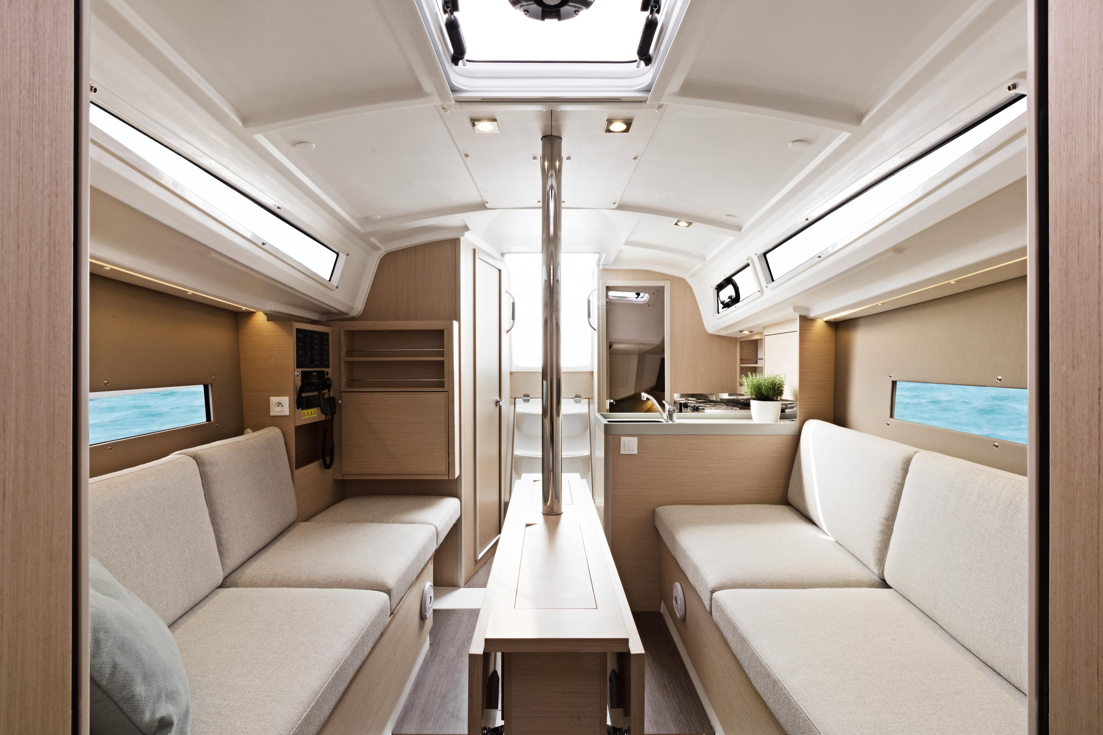 Interior of 2026 Beneteau Oceanis 30.1 sailboat, featuring modern seating and natural light.
