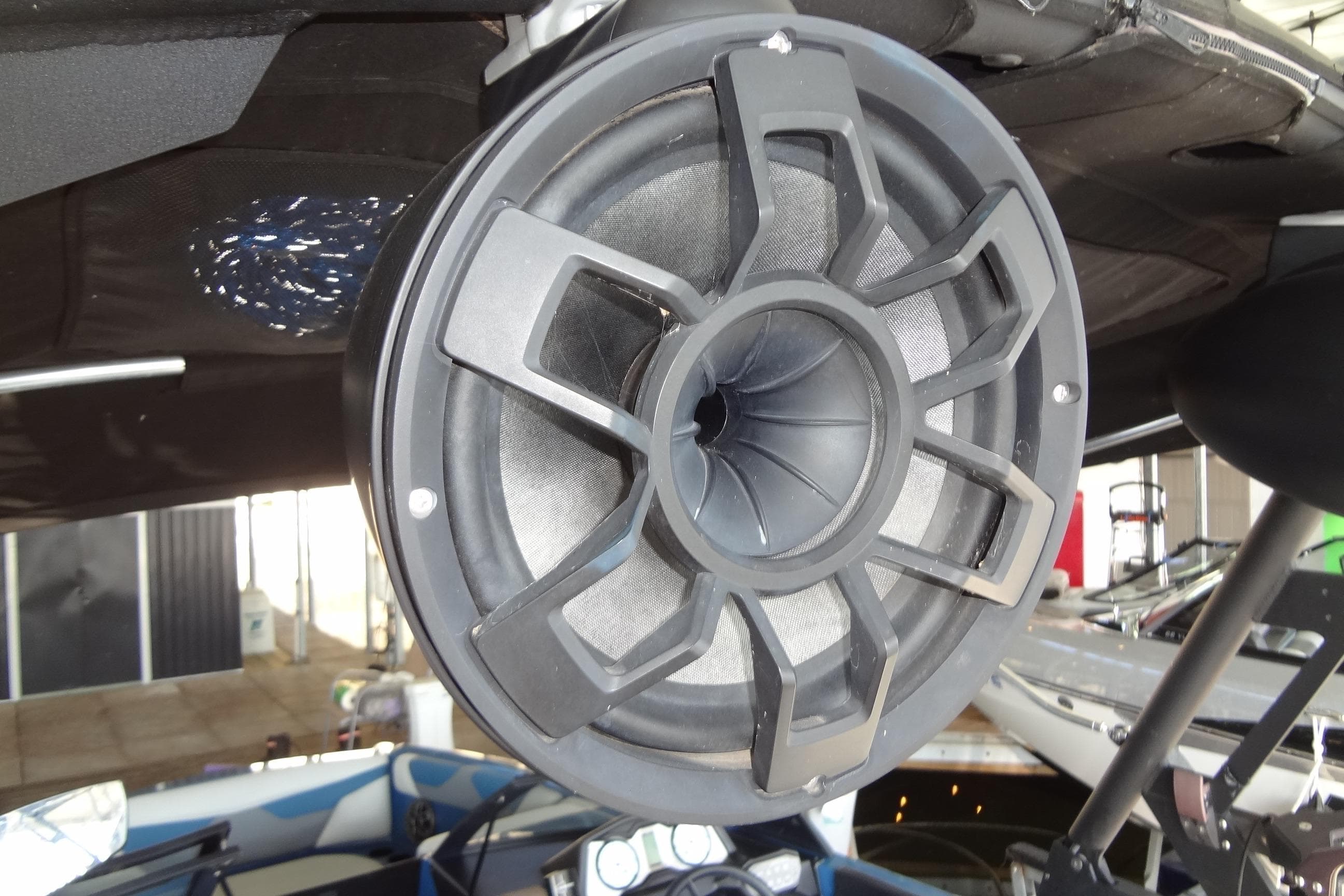 2021 Axis A24 boat speaker system, close-up view in a showroom setting.