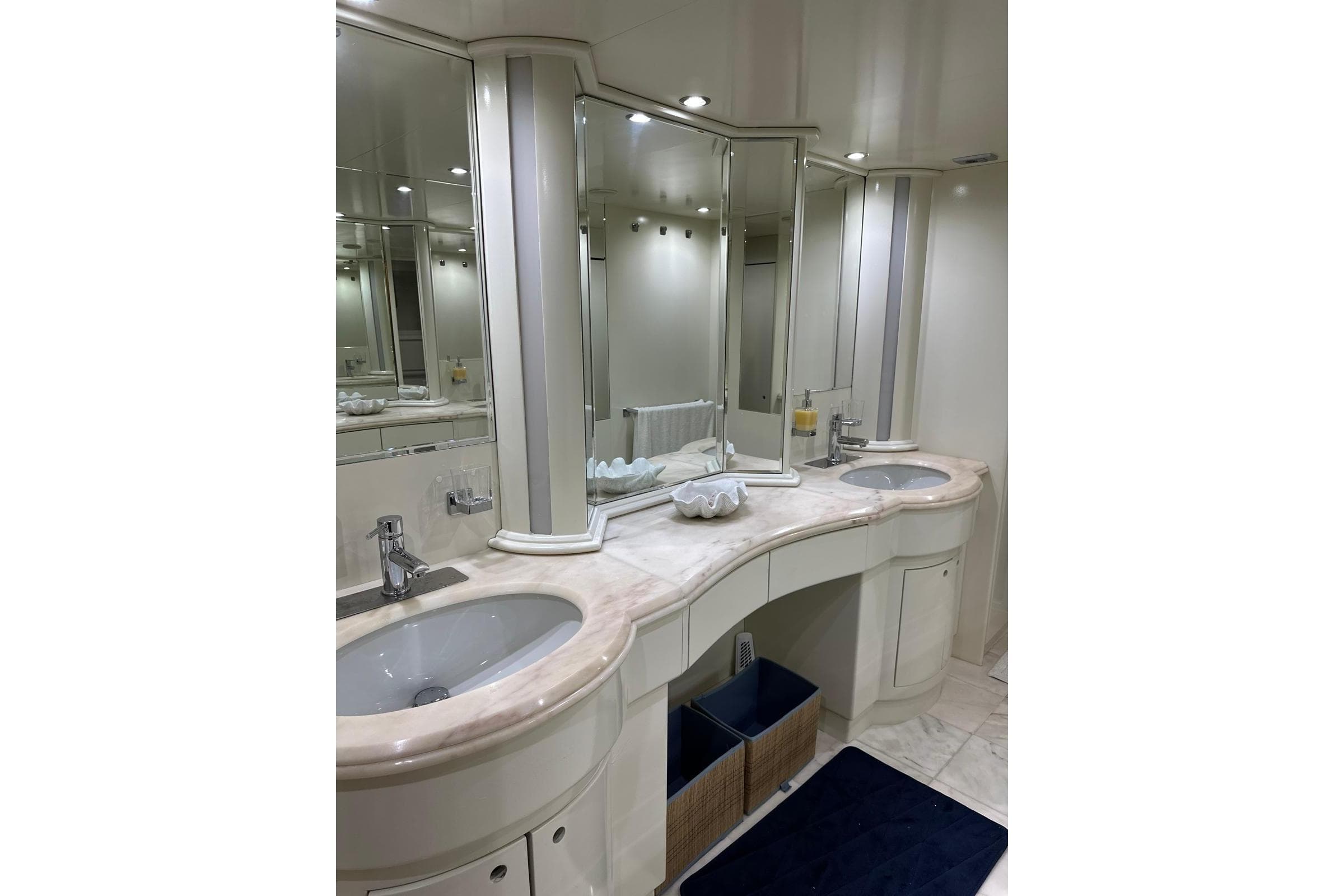Luxurious bathroom with dual sinks and mirrors on Italversil Superphantom 80 yacht, 1993 model.
