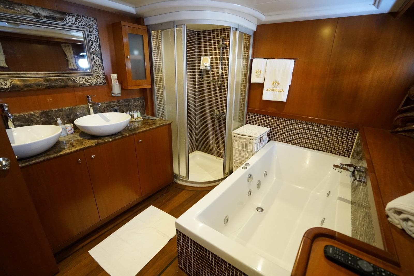 Luxurious bathroom on a 2007 Custom 32 metre Gulet, featuring a jacuzzi and modern shower.