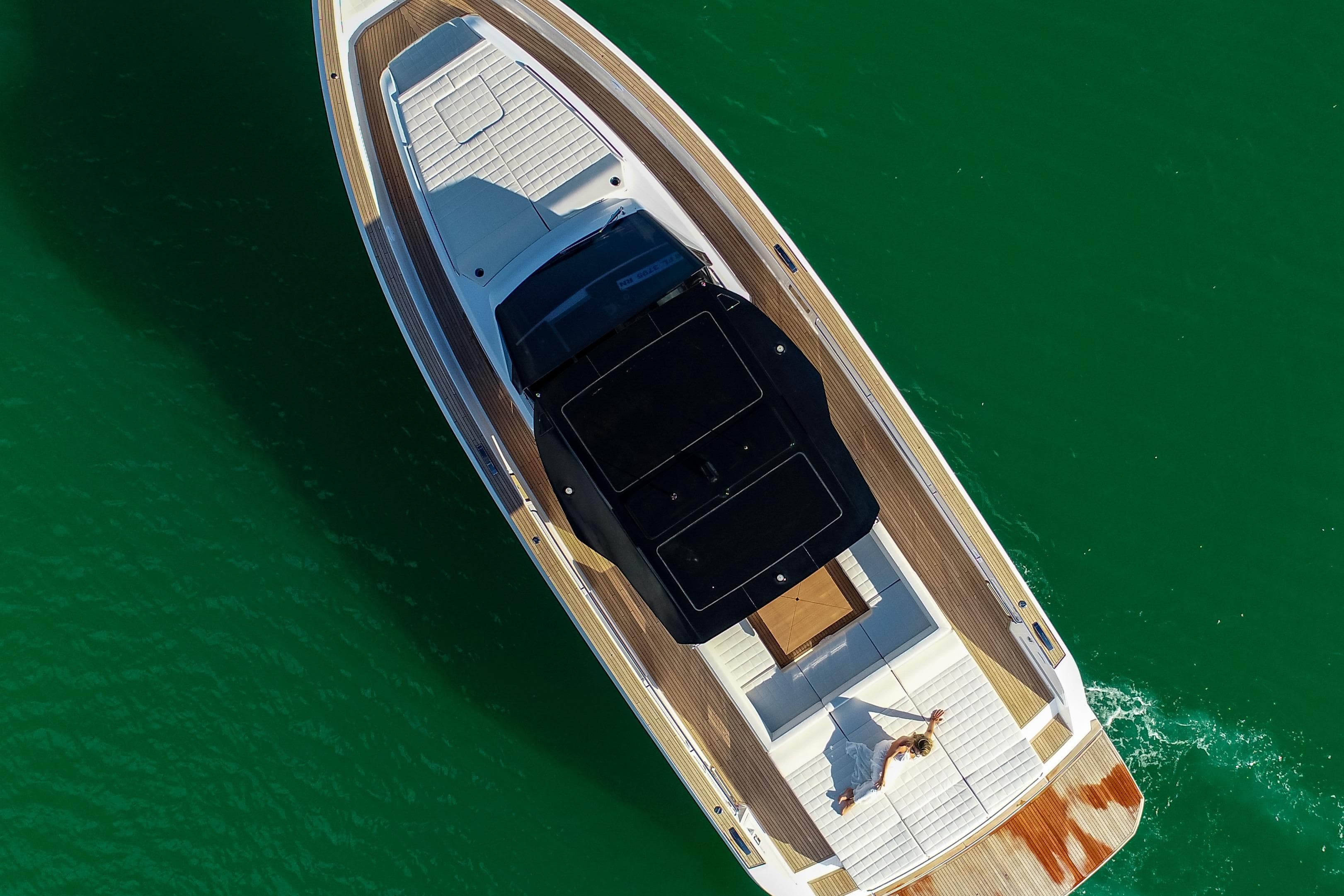 Aerial view of 2025 Pardo Yachts 50 cruising on emerald waters.