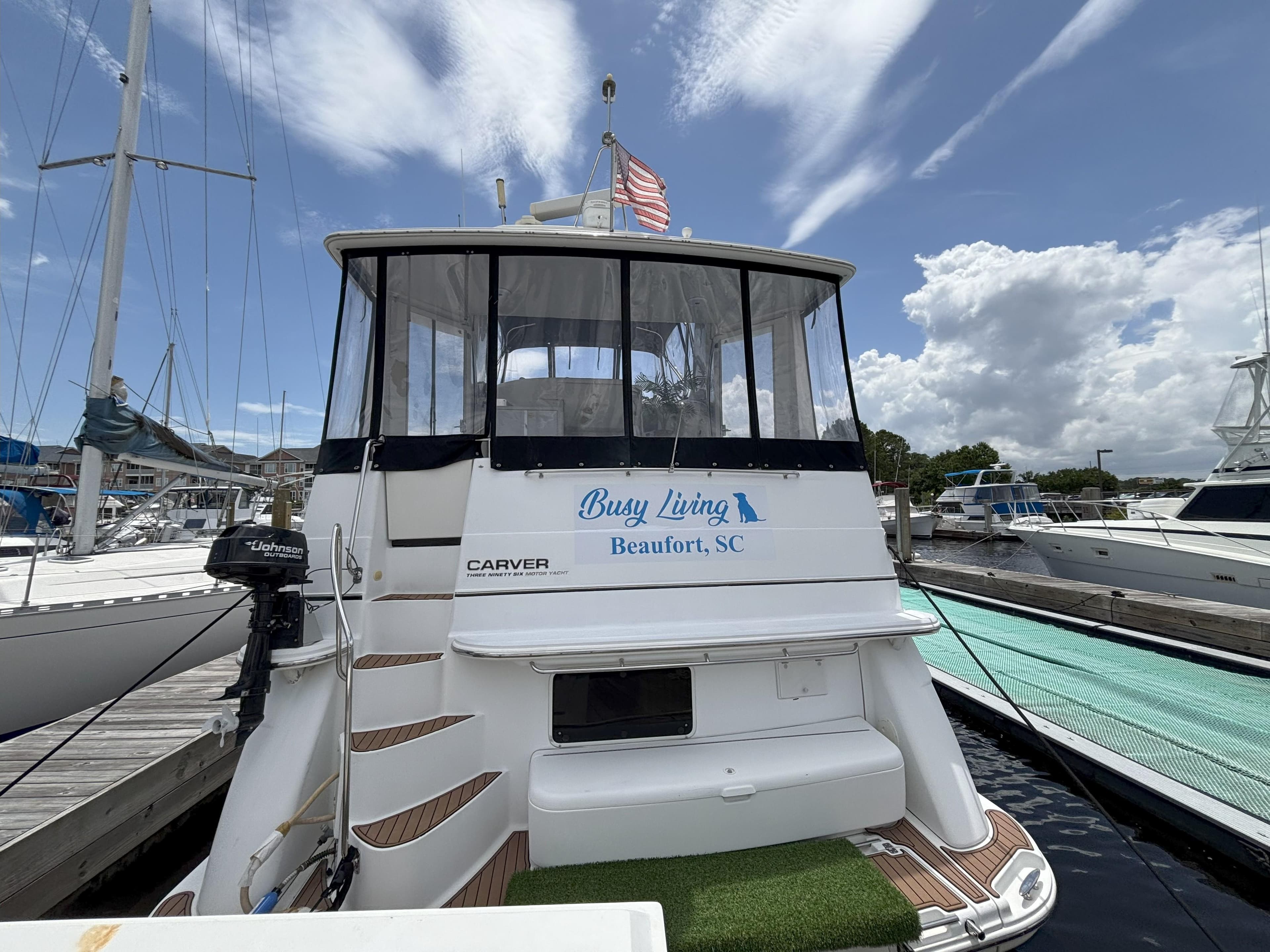 2001 Carver 396 Aft Cabin MY docked, featuring "Busy Living" from Beaufort, SC.