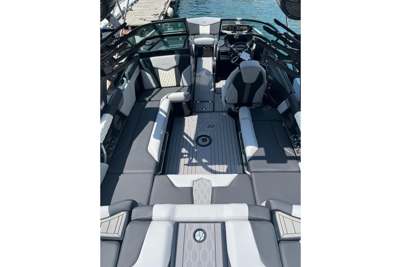 2023 MasterCraft XT22 boat interior with sleek seating and modern design.