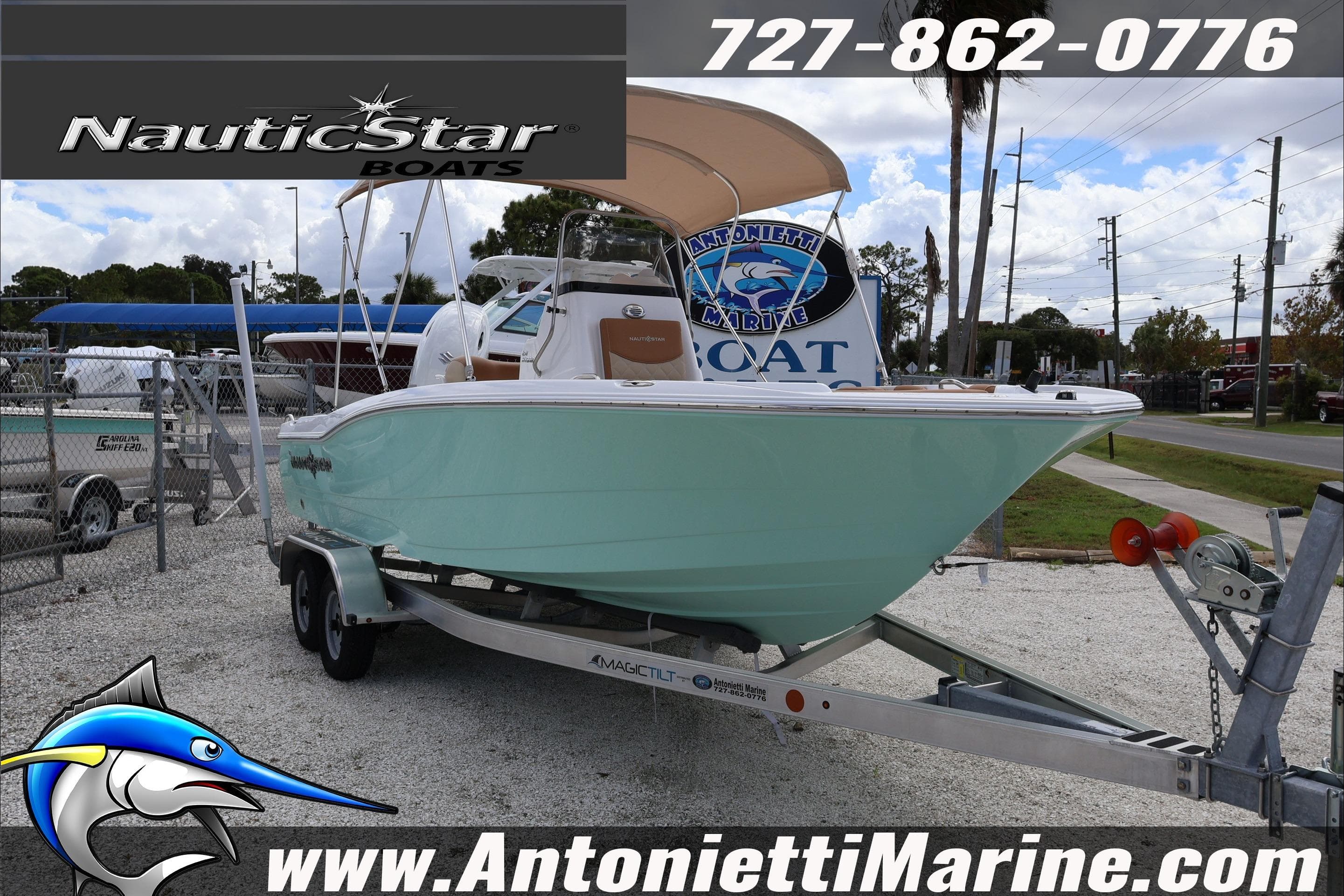 2026 NauticStar 191 Hybrid boat on trailer at Antonietti Marine dealership.