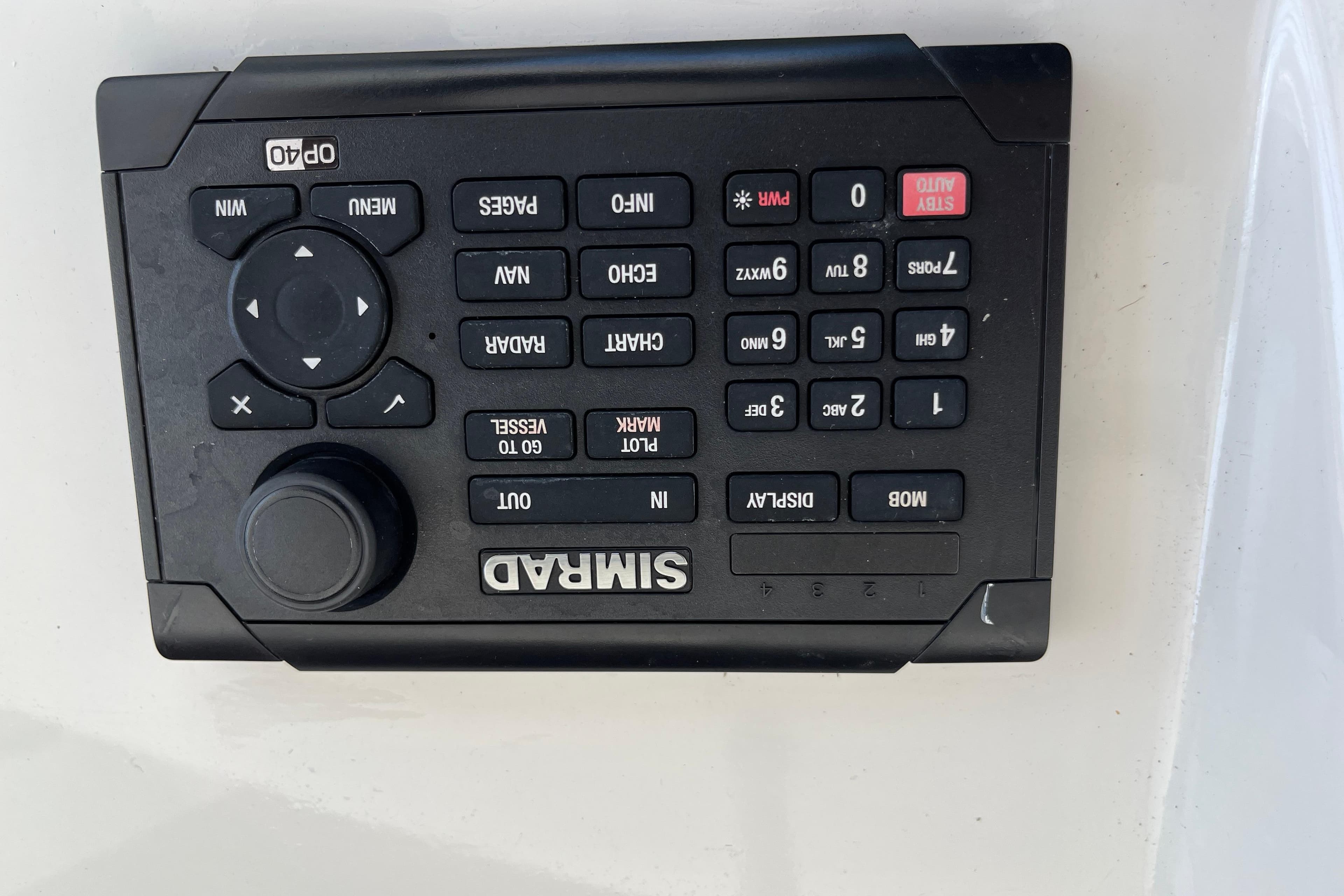 Simrad marine control panel on a 1997 Post Sportfish boat.