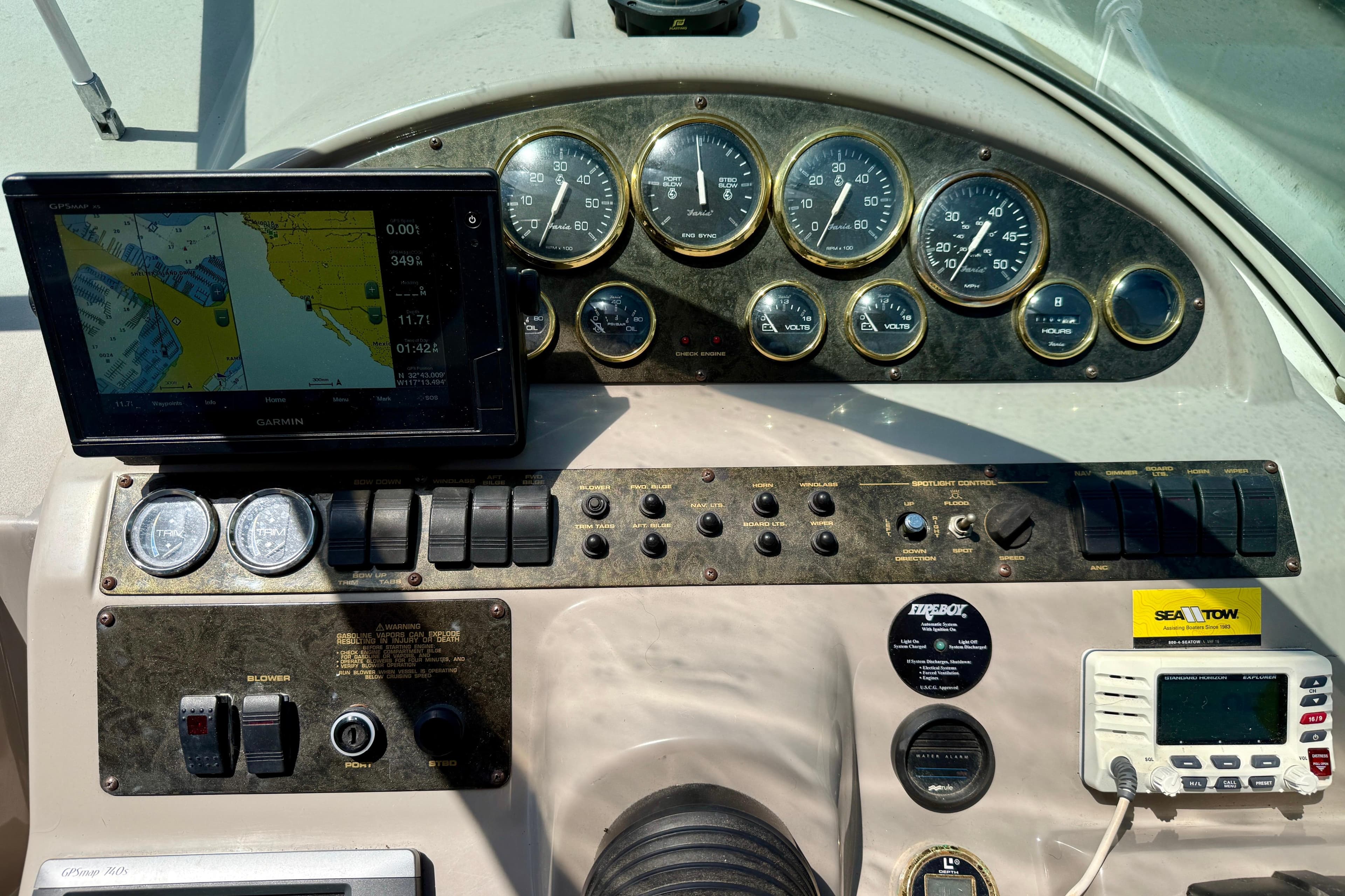 Dashboard of a 2002 Cruisers Yachts 2870 Express with navigation and control instruments.