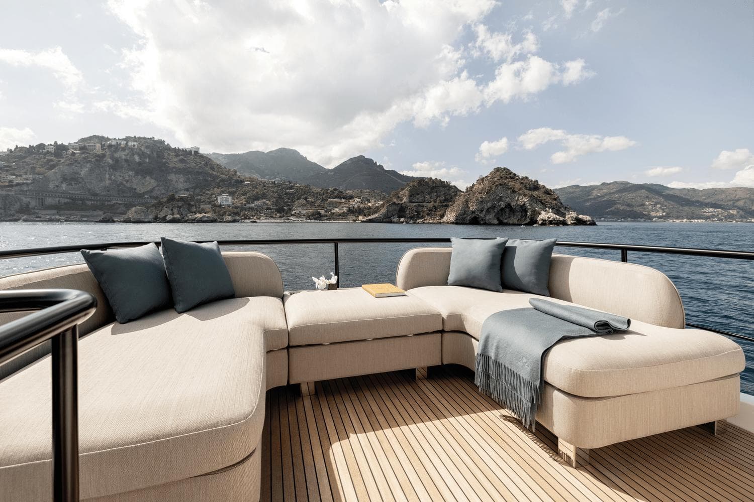 Luxurious Azimut Magellano 60 yacht deck with elegant seating, ocean view, 2025 model.