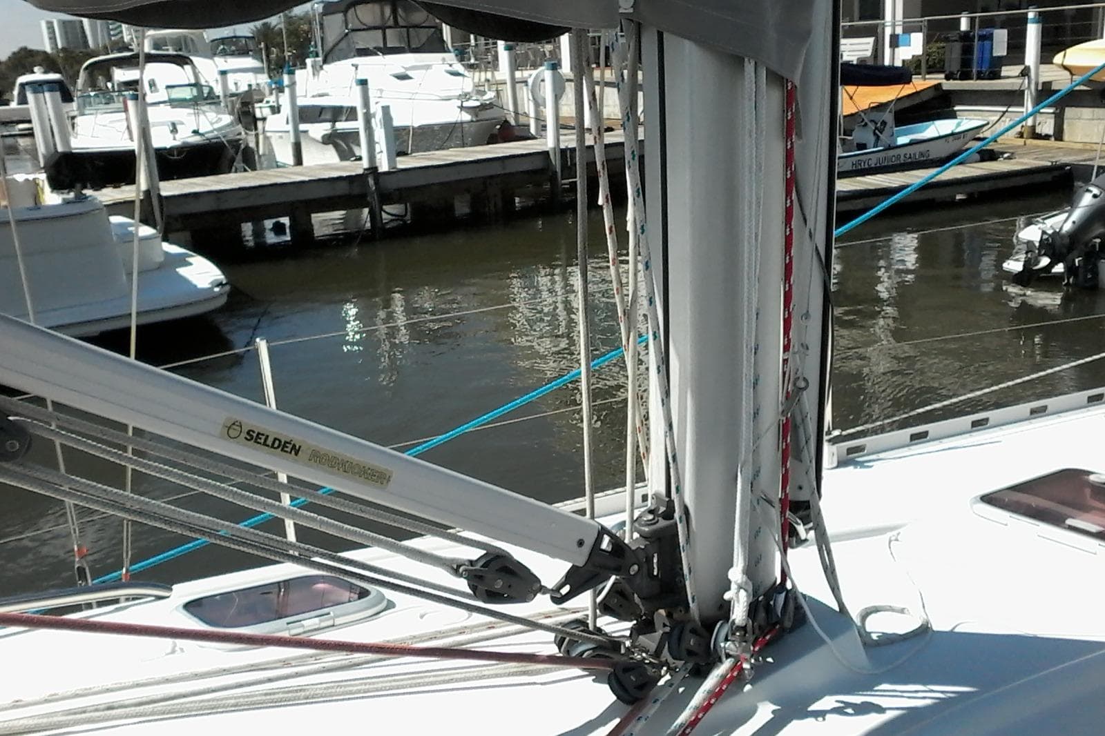 Delphia 33 sailboat from 2007 docked, featuring Selden mast and rigging.