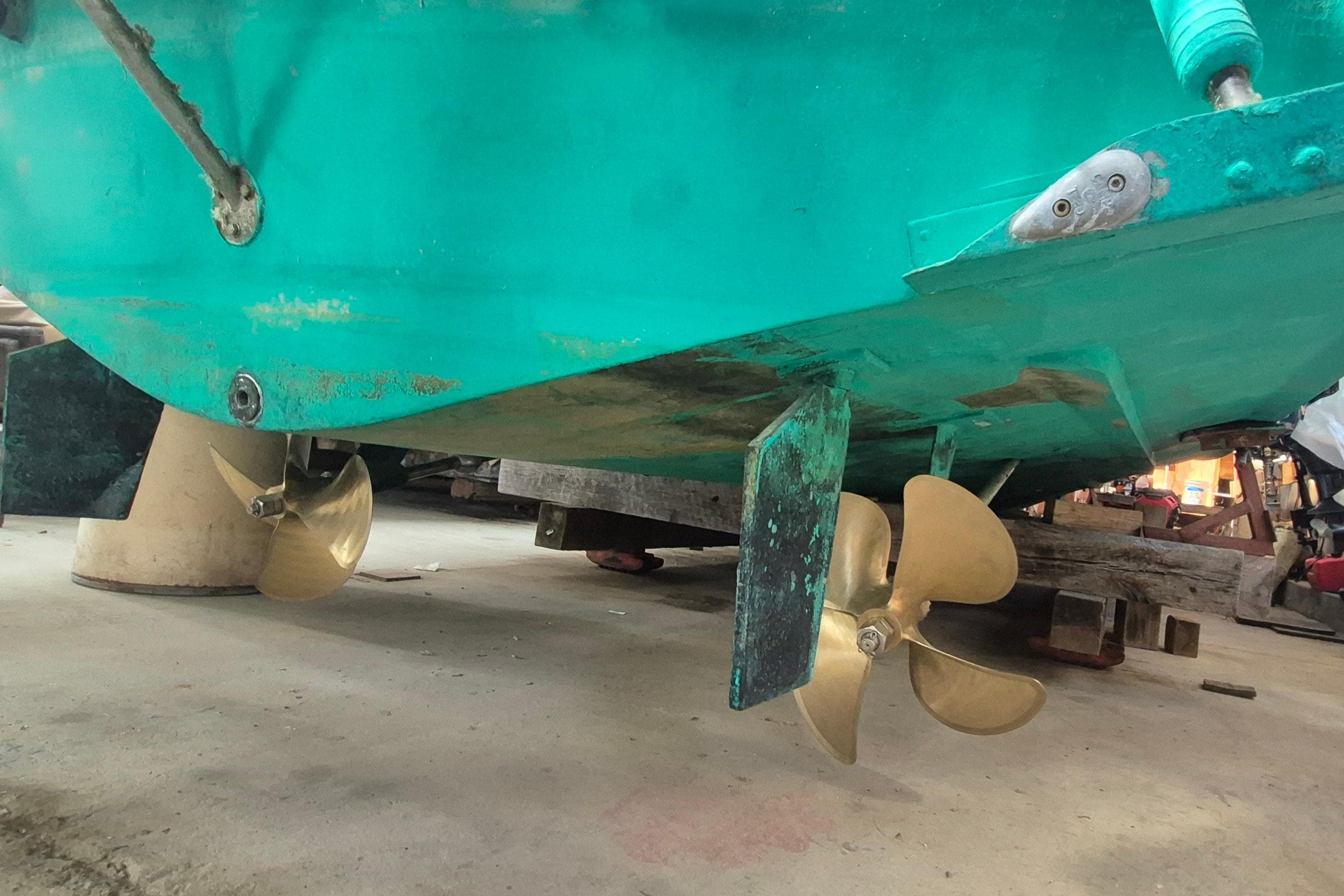 1990 Little Harbor Express boat propellers and rudder in dry dock.