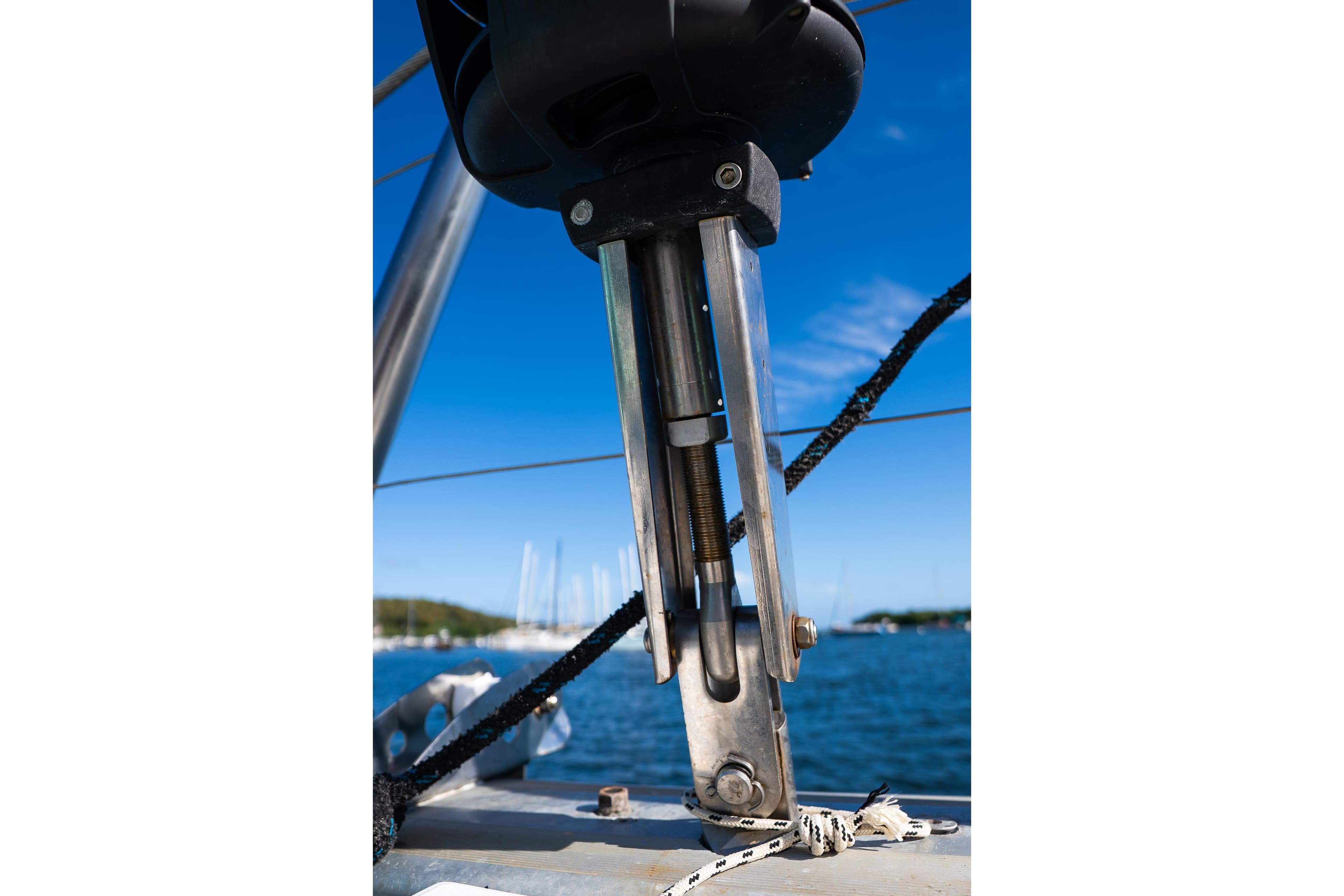 Close-up of a 2007 Lagoon 500 sailboat rigging against a clear blue sky.