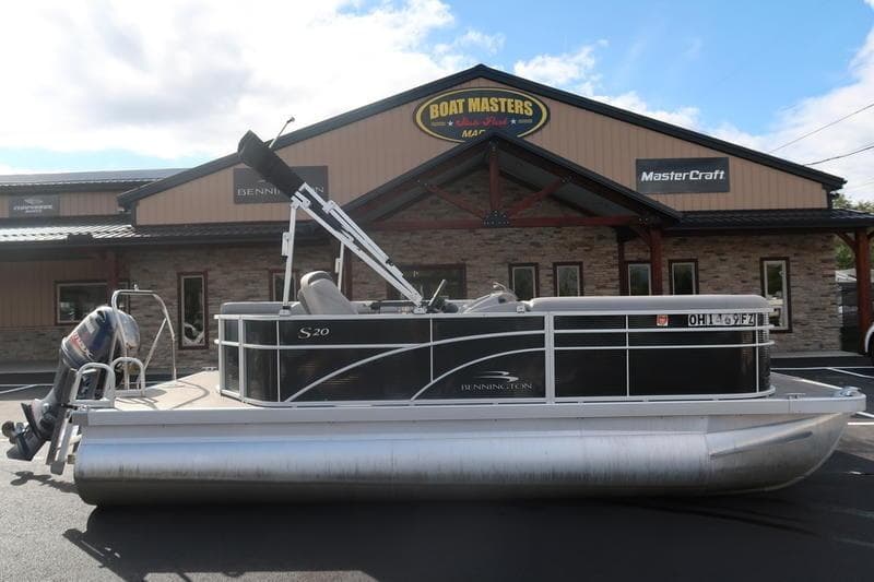 2020 Bennington 20 SLMX pontoon boat parked outside Boat Masters dealership.