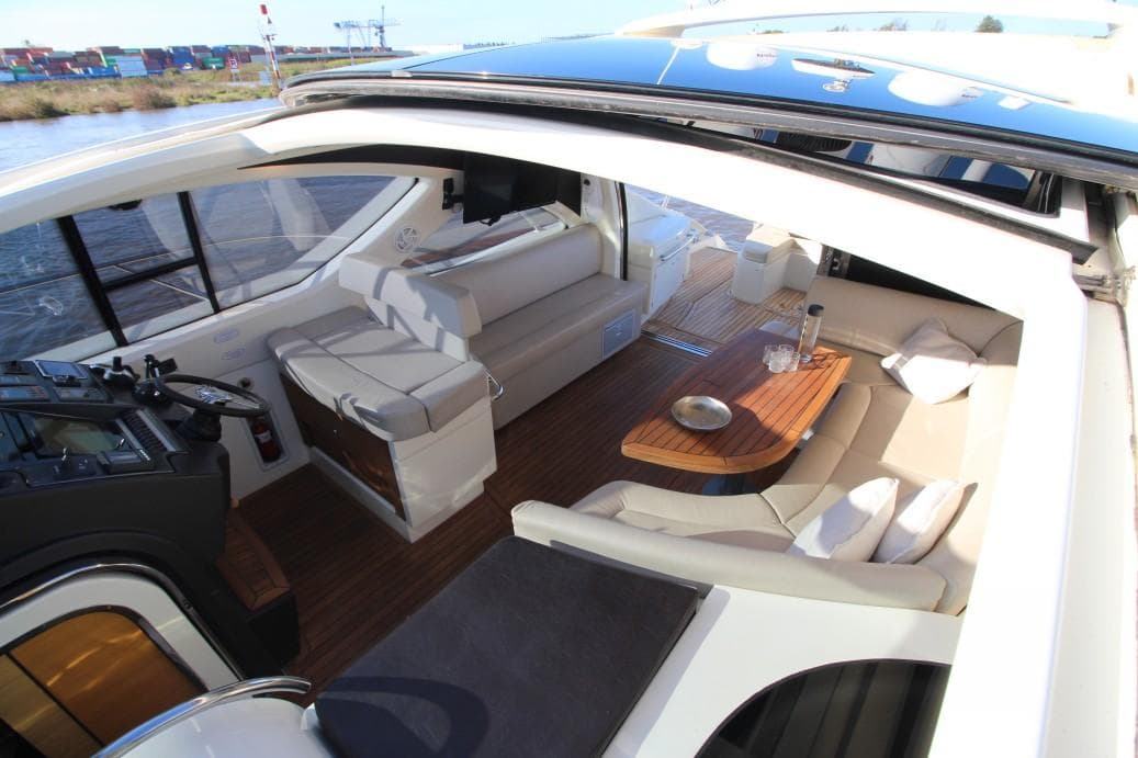 Luxurious 2009 Atlantis 50x4 yacht interior with elegant seating and modern design.