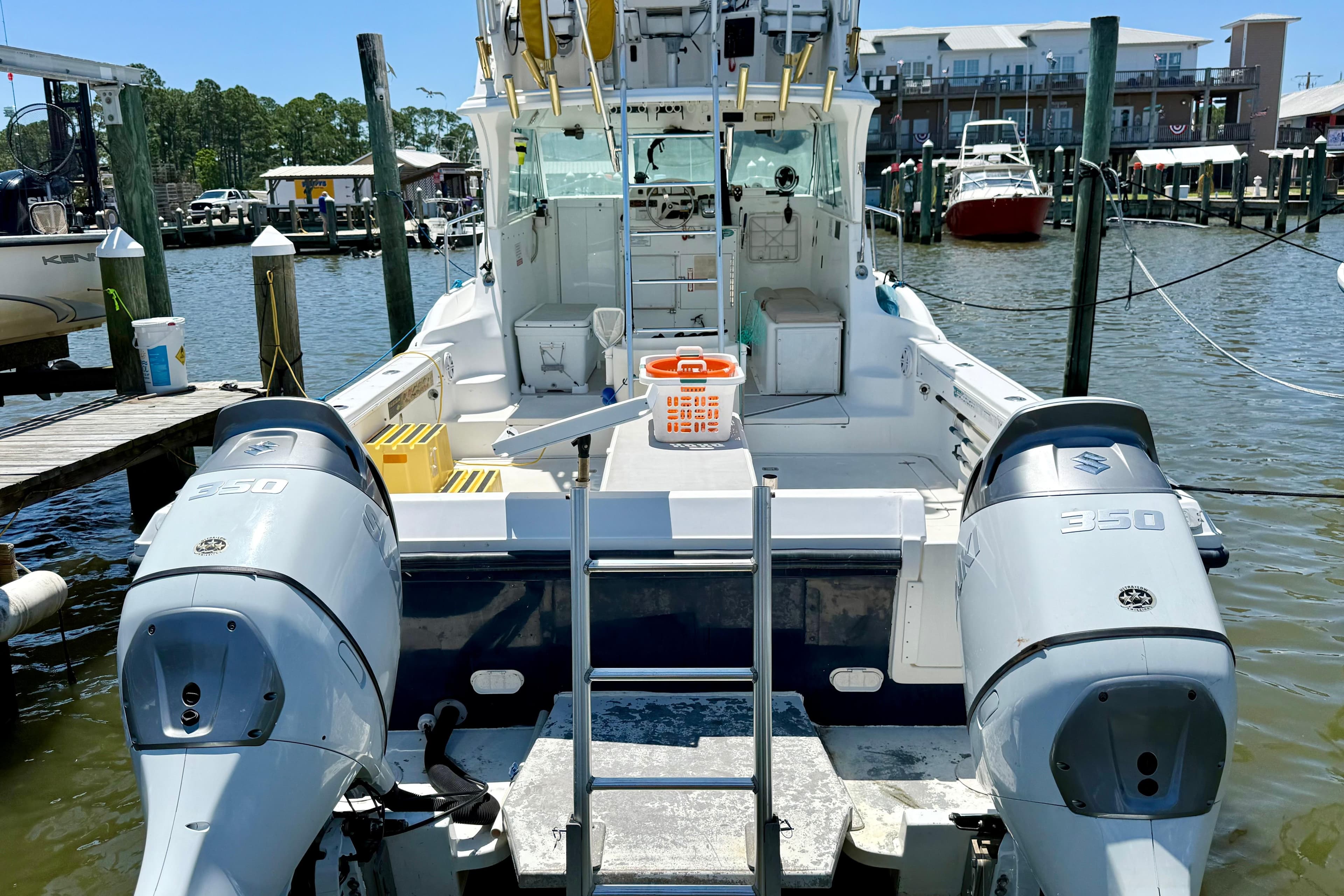2000 BAJA CRUISER King Cat 340 docked with twin Suzuki 350 engines.
