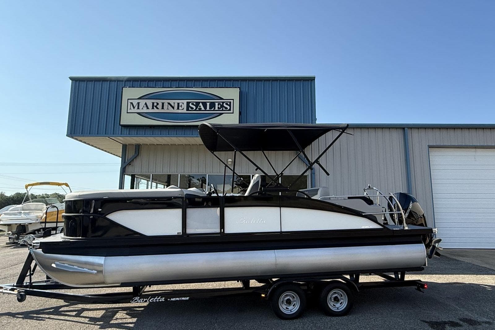 2025 Barletta Cabrio 22UC pontoon boat at Marine Sales dealership.