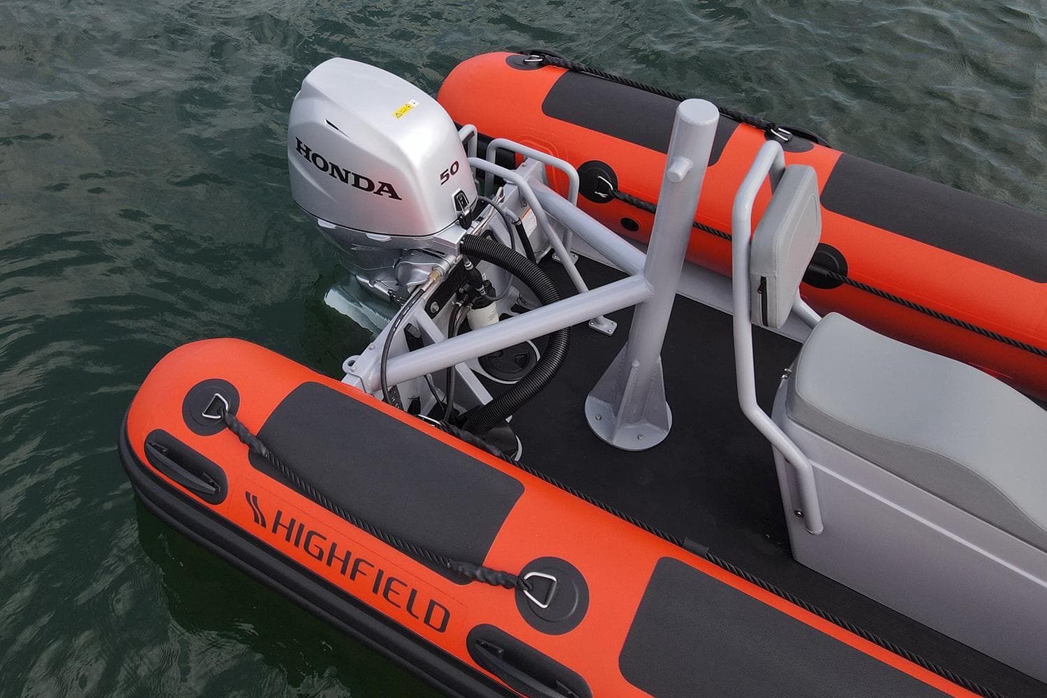 2024 Highfield Patrol 420 boat with Honda engine on water.