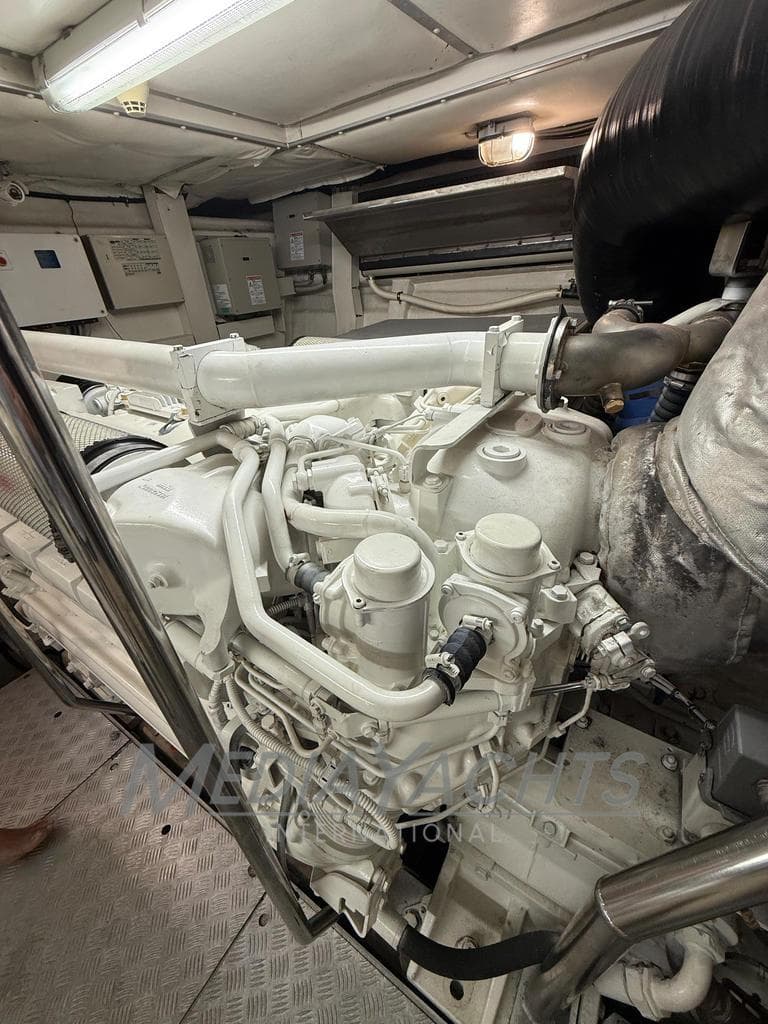 Engine room of a 2007 Riva Venere 75 yacht, showcasing detailed machinery.
